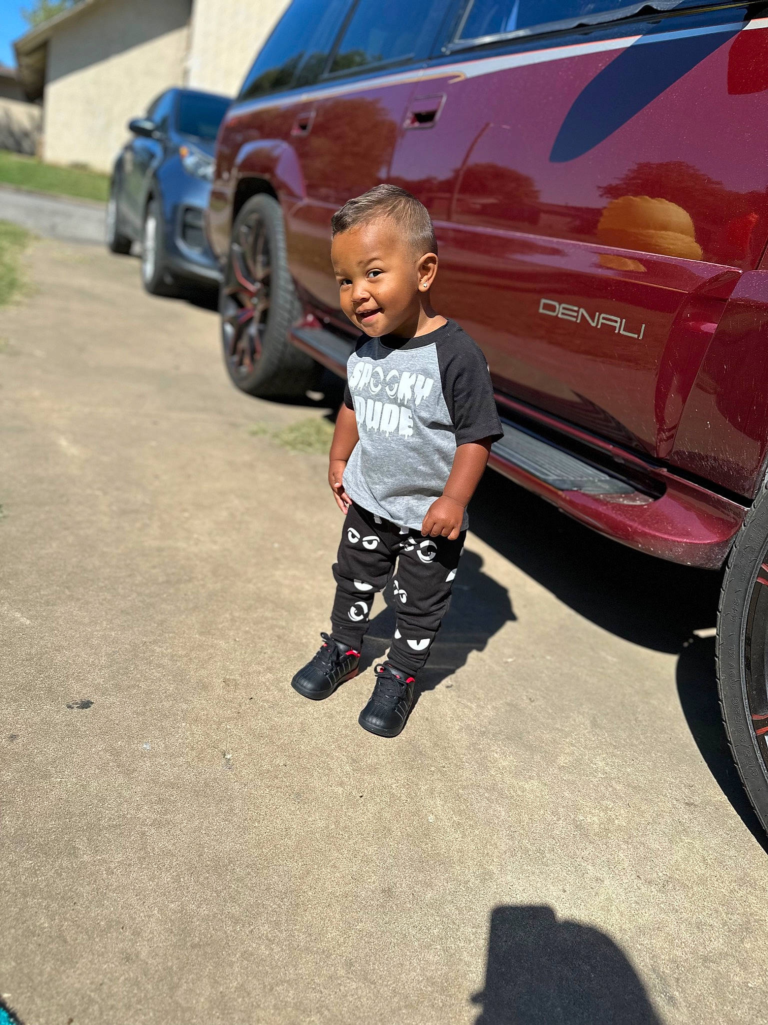 Deonte joined the competition — help win amazing prizes! alloy_wheel, asphalt, auto_part, automotive_design, automotive_exterior, automotive_lighting, automotive_tail_brake_light, automotive_tire, automotive_wheel_system, bumper, car, fender, hood, land_vehicle, motor_vehicle, person, rim, tire, vehicle, vehicle_door