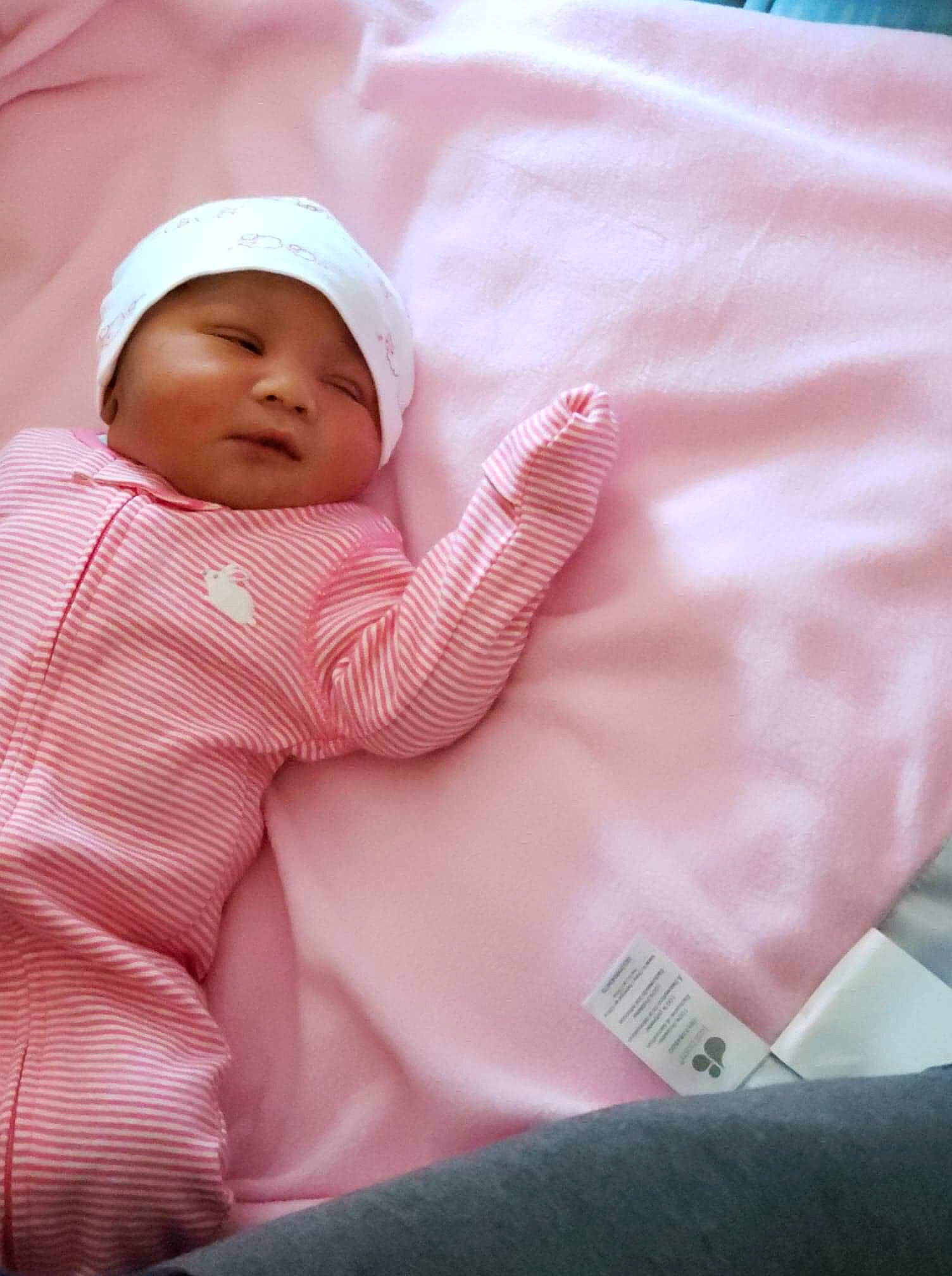 Maleah is registered to the contest to win money with this photo: baby, child, headwear, linens, person, pink, skin, sleep, toddler