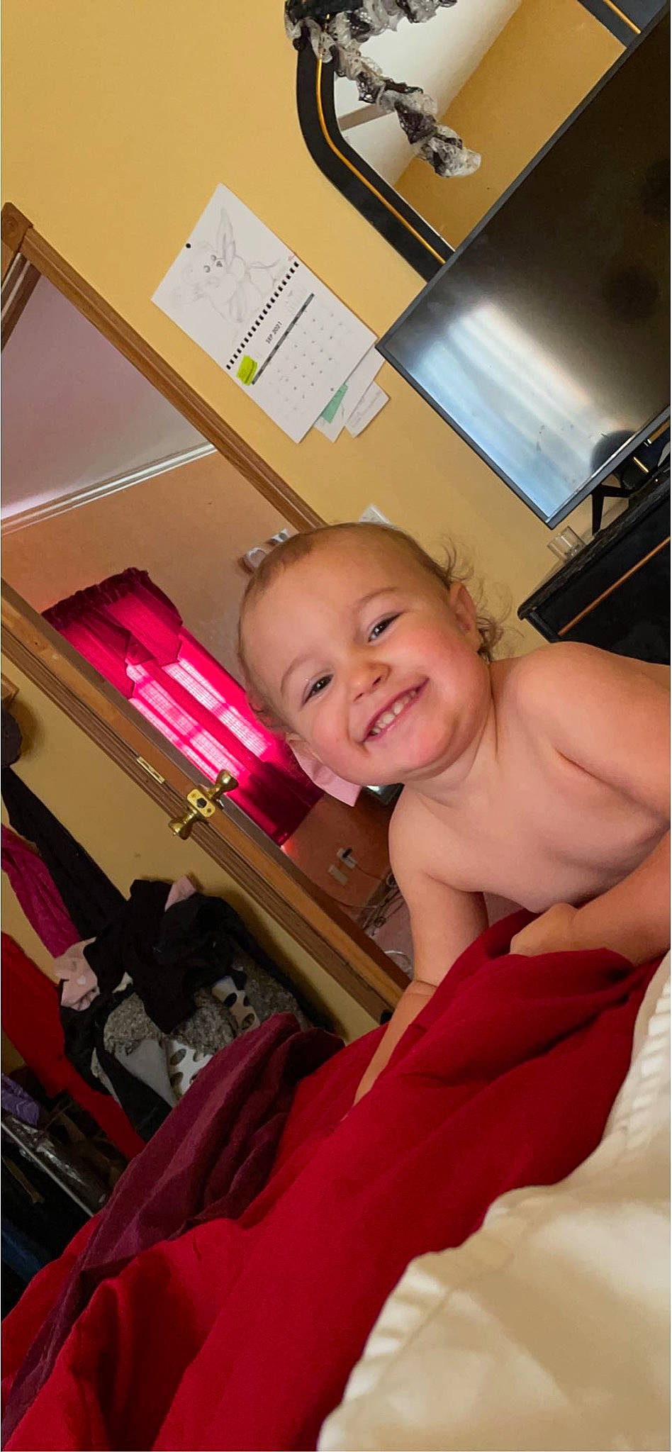 Jaslyn joined the competition — help win amazing prizes! bag, bathing, box, chest, child, comfort, finger, flooring, fun, happy, joy, laugh, leisure, luggage_and_bags, magenta, person, pink, room, sitting, smile