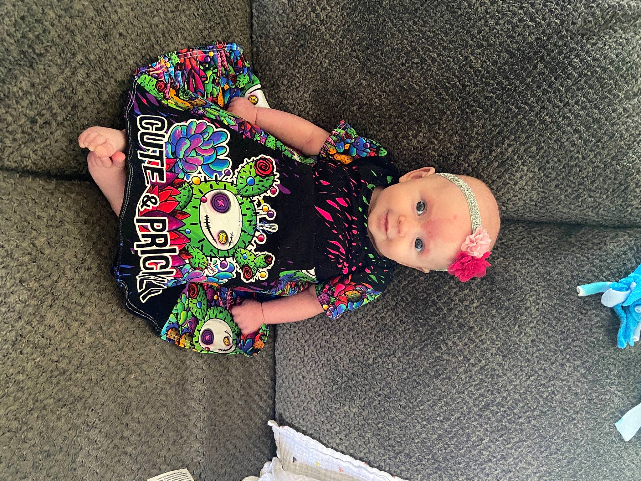 Mayleigh is registered to the contest to win money with this photo: baby, baby_products, baby_toddler_clothing, baby_toys, child, doll, dress, fashion_accessory, head, headwear, linens, pattern, person, pink, play, sleeve, sock, stuffed_toy, textile, toddler