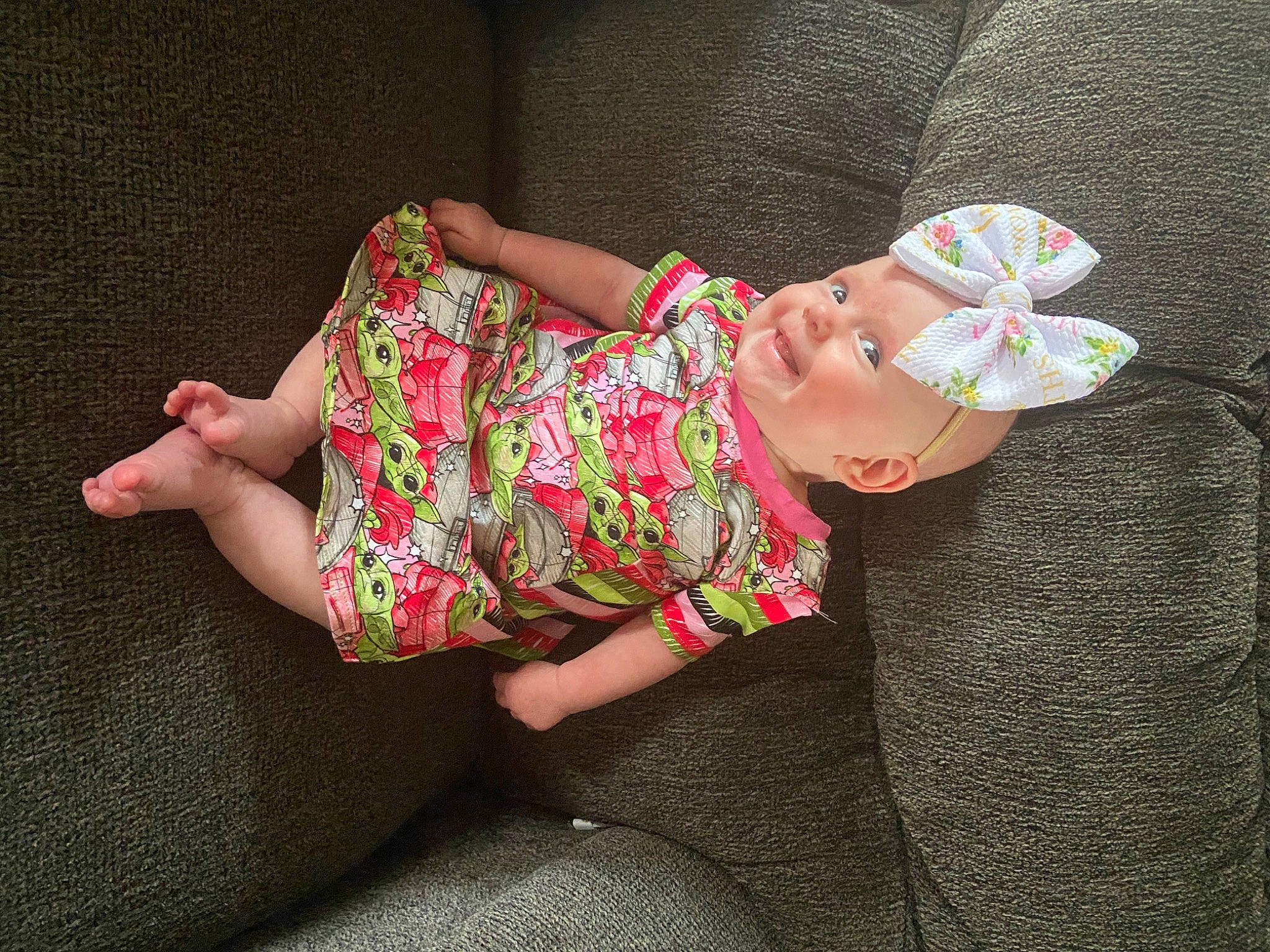 Mayleigh is registered to the contest to win money with this photo: baby, baby_toddler_clothing, comfort, elbow, finger, hat, headgear, human_body, human_leg, knee, magenta, neck, pattern, person, pink, sleeve, sock, t_shirt, thigh, toddler