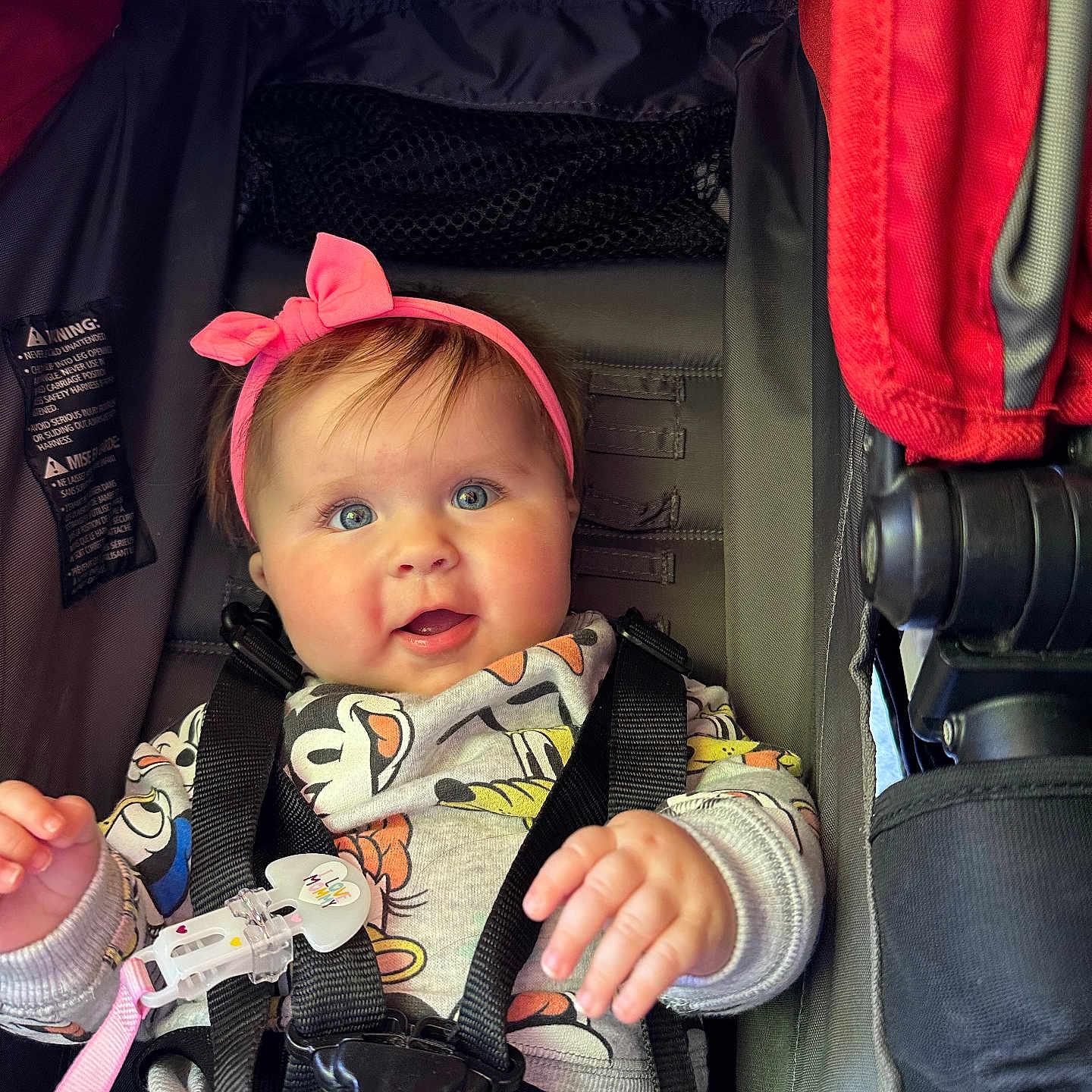 Amelia joined the competition — help win amazing prizes! accessories, baby, bodypart, car, car_interior, carseat, clothing, coat, face, finger, hand, hat, head, jacket, person, photography, portrait, stroller, transportation, vehicle