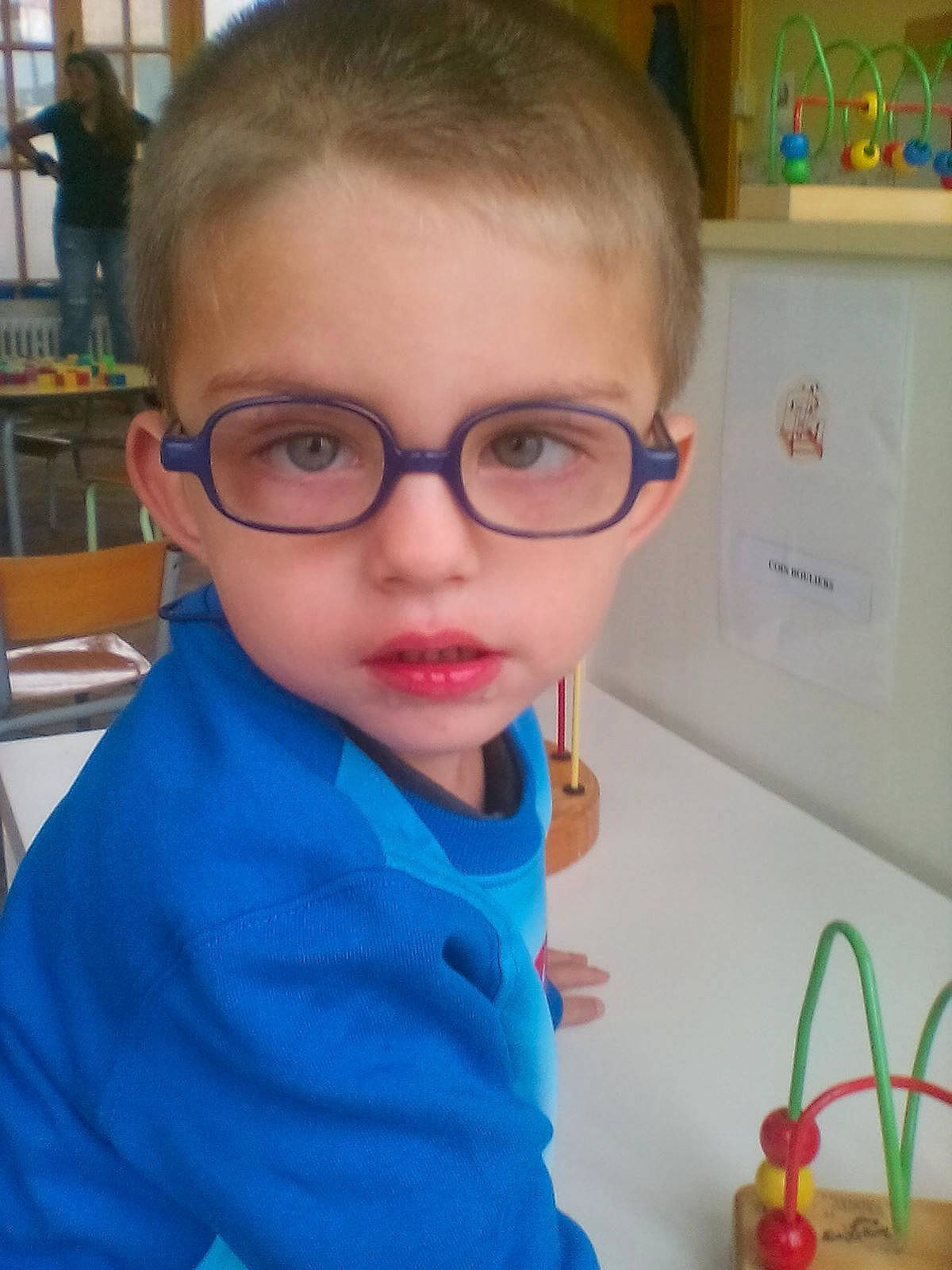 Evan a rejoint le concours — aidez-le/la à gagner de superbes lots ! baby, cheek, child, ear, eye, eyewear, face, forehead, glasses, head, lip, nose, organ, person, play, smile, toddler, toy, vision_care