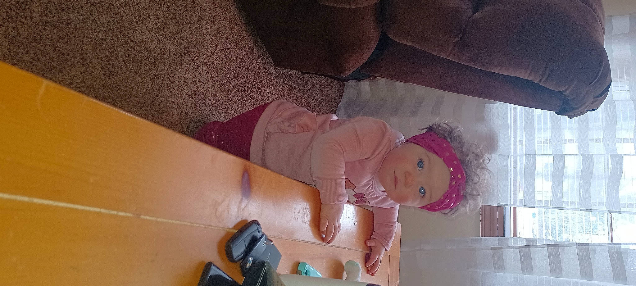 Lilli joined the competition — help win amazing prizes! baby, baby_products, baby_toddler_clothing, bag, camera, child, comfort, flooring, headwear, human_body, human_leg, knee, linens, luggage_and_bags, magenta, person, pink, room, thigh, toddler