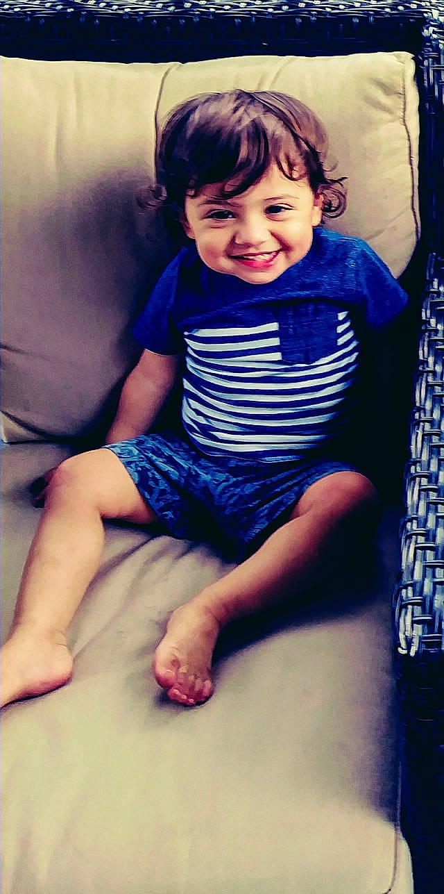 Xzavier is registered to the contest to win money with this photo: arm, blue, child, cool, day, finger, fun, girl, happiness, infant, joint, joy, leg, person, product, shoulder, sitting, smile, standing, thigh