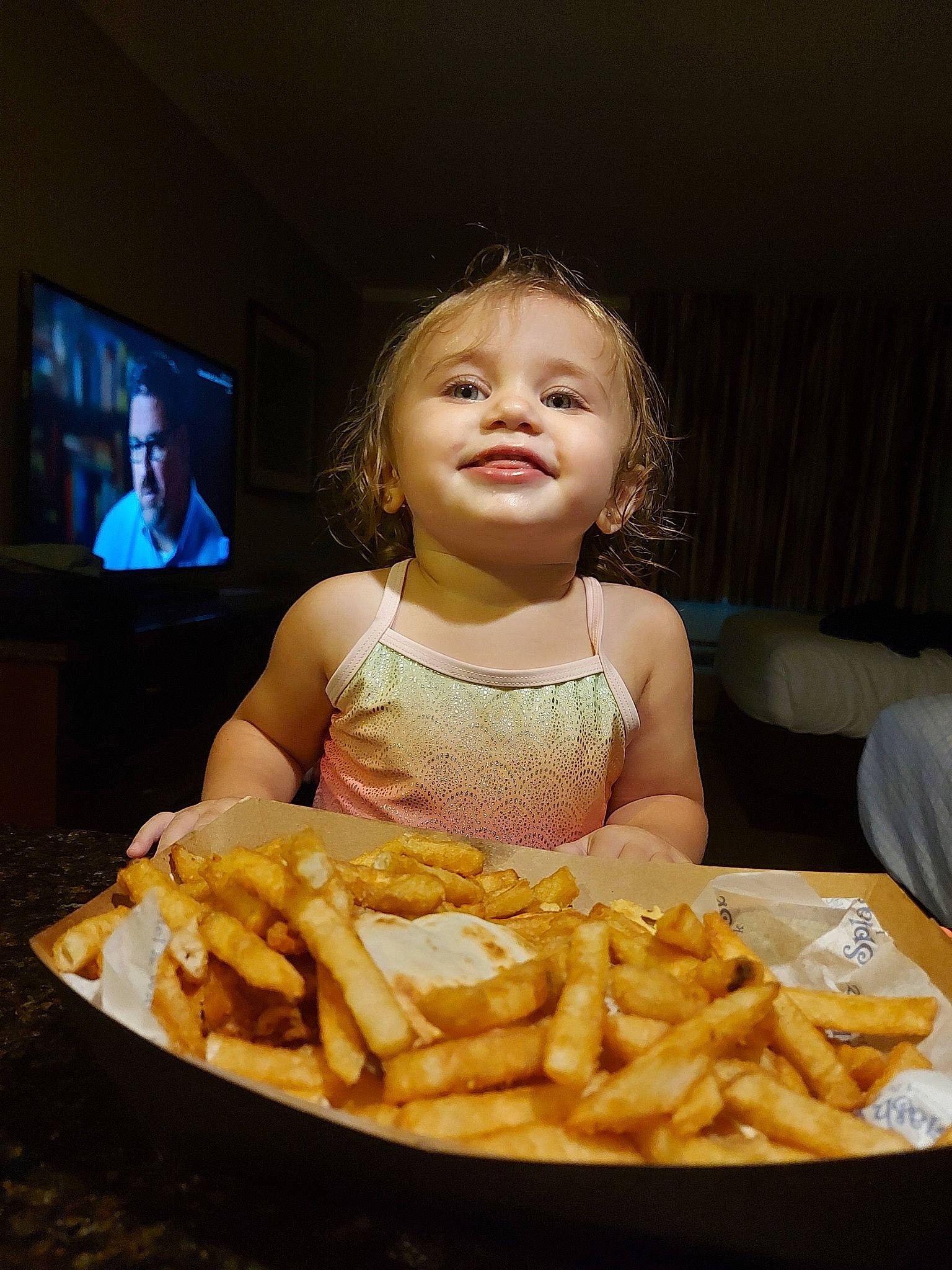 Natalia is registered to the contest to win money with this photo: american_food, canadian_cuisine, child, comfort_food, cuisine, dish, eating, fast_food, fish_and_chips, food, french_fries, fried_food, joy, junk_food, kids_meal, meal, person, side_dish, snack, vegetarian_food
