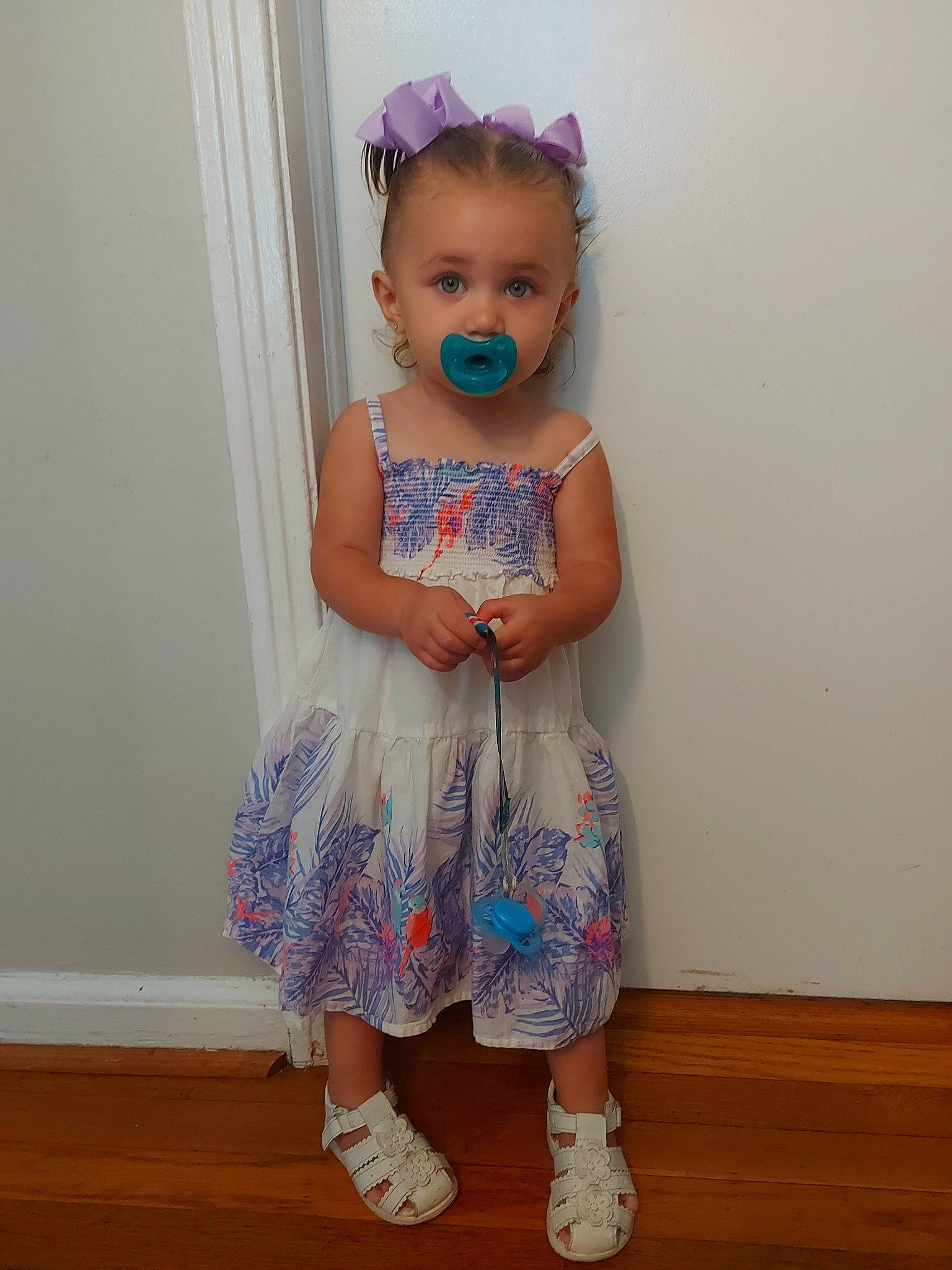 Natalia is registered to the contest to win money with this photo: baby, baby_products, baby_toddler_clothing, blue, cheek, child, clothing, costume, dress, hair_accessory, headband, headgear, iris, pattern, person, pink, product, purple, skin, standing