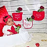 baby, infant, valentines_day, red, white, heart, rose, headband, pillow, blanket, fluffy, smiling, cute, decorations, holiday, celebration, wooden_wall, portrait, sitting, cozy