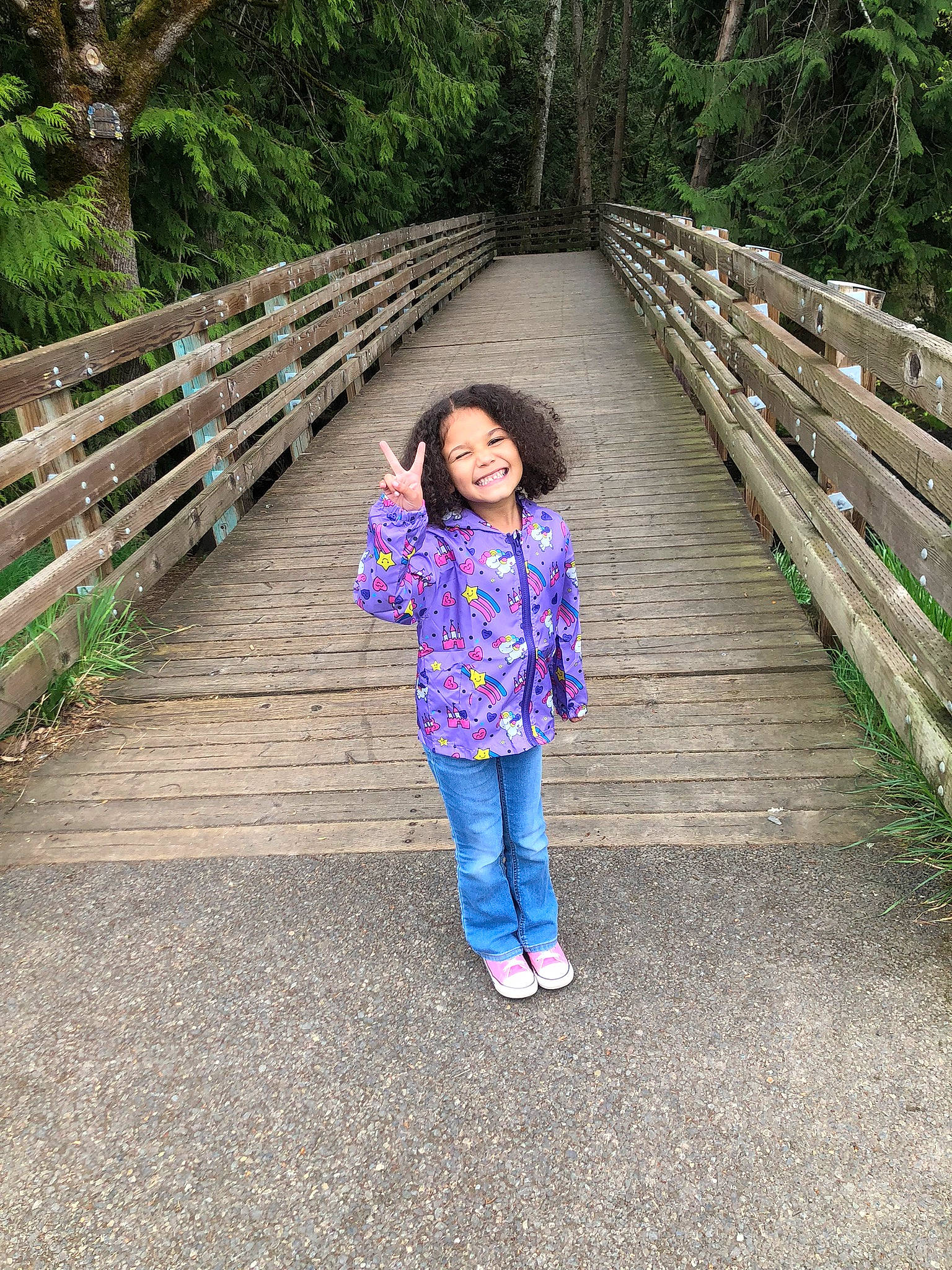 Aaliyah joined the competition — help win amazing prizes! beauty, botany, bridge, child, electric_blue, fence, fun, grass, happy, jacket, joy, leaf, leisure, nature, people_in_nature, person, plant, recreation, smile, toddler