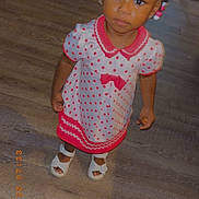 Amirica joined the competition — help win amazing prizes! child, toddler, dress, polka_dot, pink, white_shoes, beads, hair, floor, indoor, wooden_floor, curious, looking_up, standing, footwear, clothing, person, cute, portrait, young_child