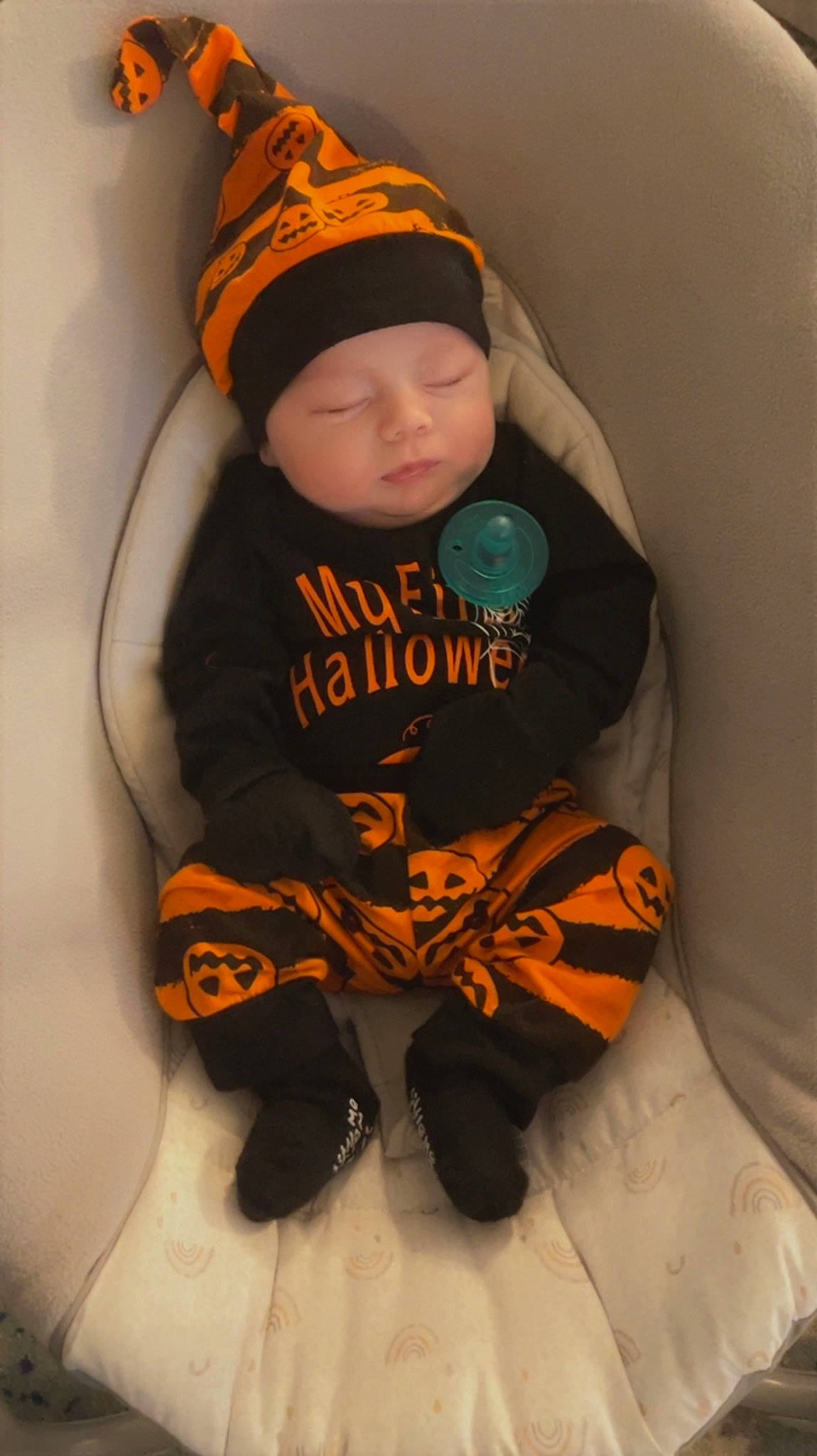 Braxton joined the competition — help win amazing prizes! baby, baby_products, baby_sleeping, baby_toddler_clothing, beanie, cap, carmine, child, comfort, face, headwear, hood, hoodie, human_body, knit_cap, orange, person, personal_protective_equipment, sitting, sleeve