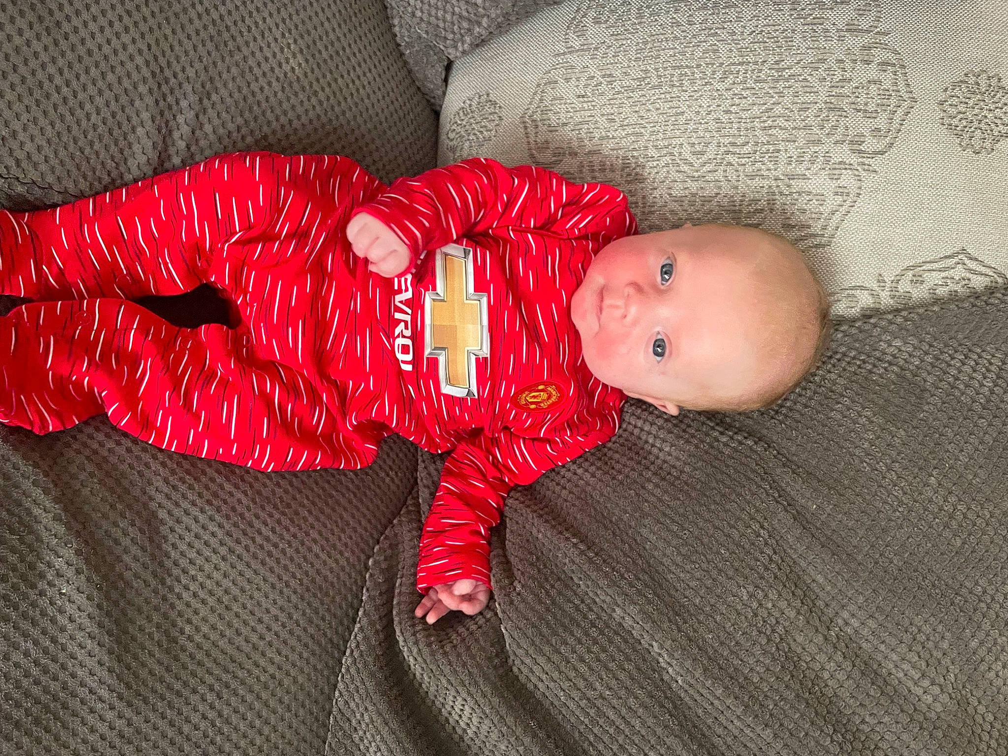 Alex joined the competition — help win amazing prizes! baby, baby_toddler_clothing, carmine, child, comfort, doll, eye, flooring, foot, head, human_body, leg, linens, pattern, person, skin, sleeve, stuffed_toy, toddler, toy