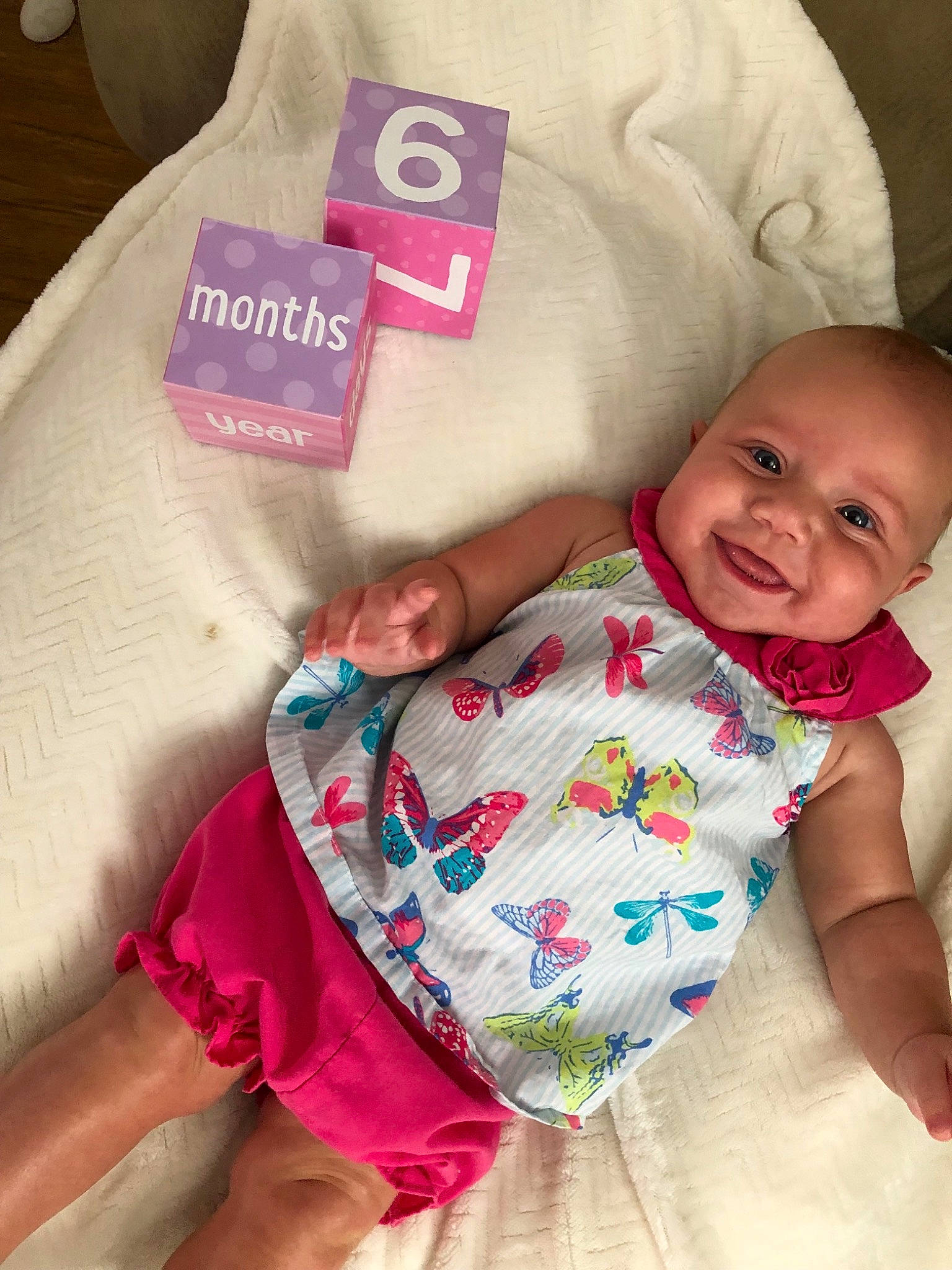 Brinlee joined the competition — help win amazing prizes! baby, baby_products, baby_toddler_clothing, child, diaper, linens, nap_mat, person, pink, product, textile, toddler