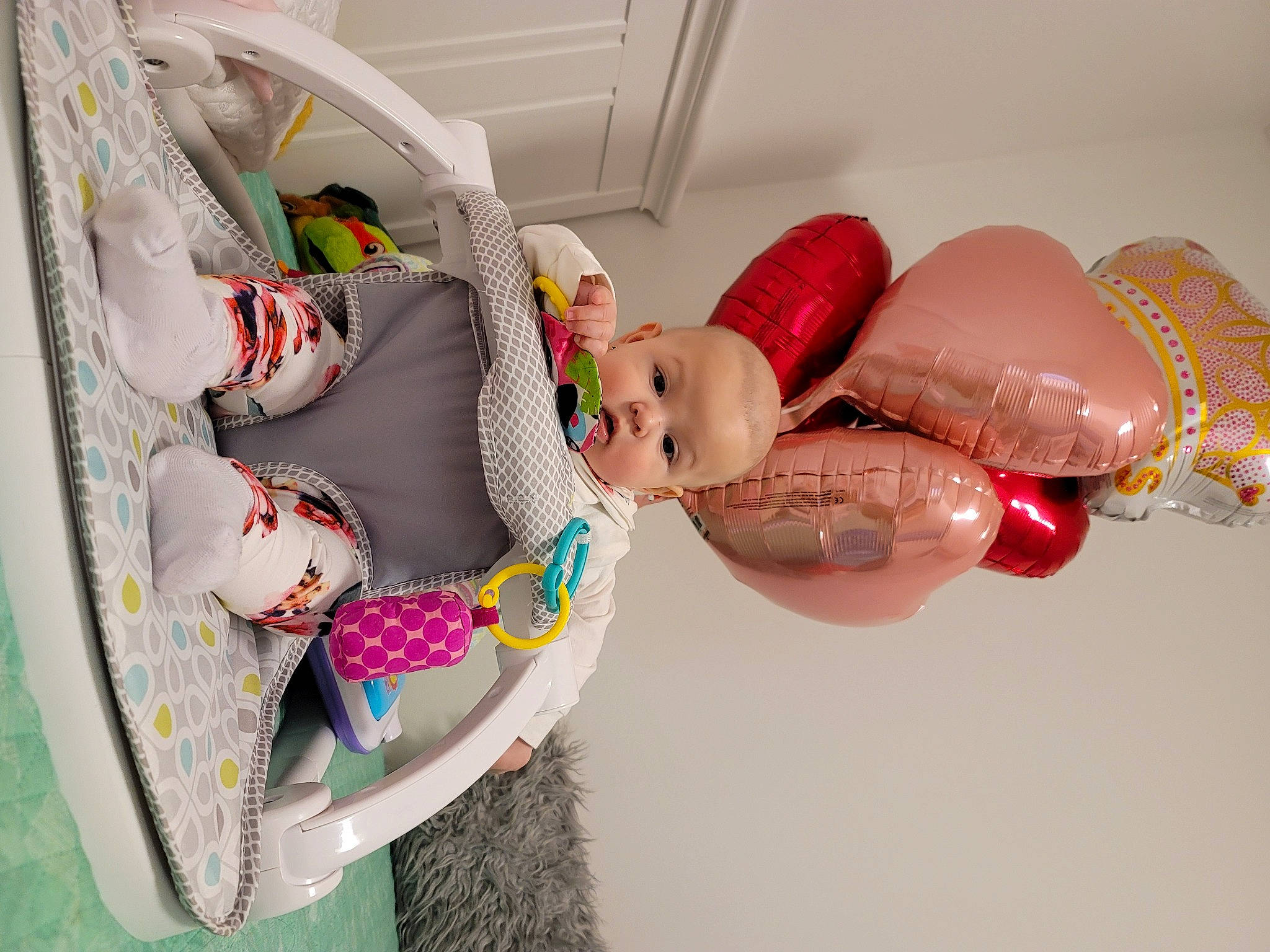 Nicole is registered to the contest to win money with this photo: abdomen, arm, baby, baby_products, chest, child, comfort, event, hand, happy, human_body, leg, person, pink, smile, textile, thigh, toddler, toy, trunk