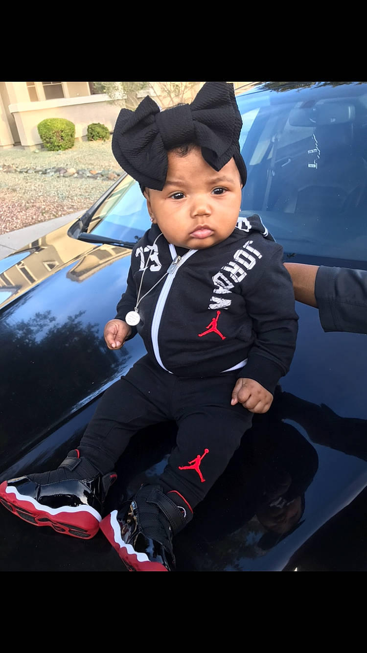 Sarenity is registered to the contest to win money with this photo: auto_part, automotive_design, automotive_window_part, black_hair, cap, car, car_seat, child, cool, family_car, glass, headgear, person, personal_protective_equipment, steering_wheel, toddler, vehicle, vehicle_door, wetsuit, window