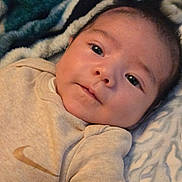 Josiah joined the competition — help win amazing prizes! baby, infant, child, portrait, face, eyes, looking_at_camera, calm, indoors, bed, blanket, bedding, onesie, clothing, cozy, close_up, head, skin, lying_down, photography