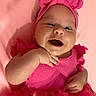 baby, pink, headband, bow, smile, happy, infant, cute, dress, tulle, child, portrait, hand, face, skin, cheerful, lying_down, closeup, clothing, background