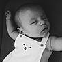 baby, sleeping, infant, black_and_white, cute, clothing, face, peaceful, portrait, closeup, child, soft, nap, babywear, adorable, rest, skin, button, expression, relaxation