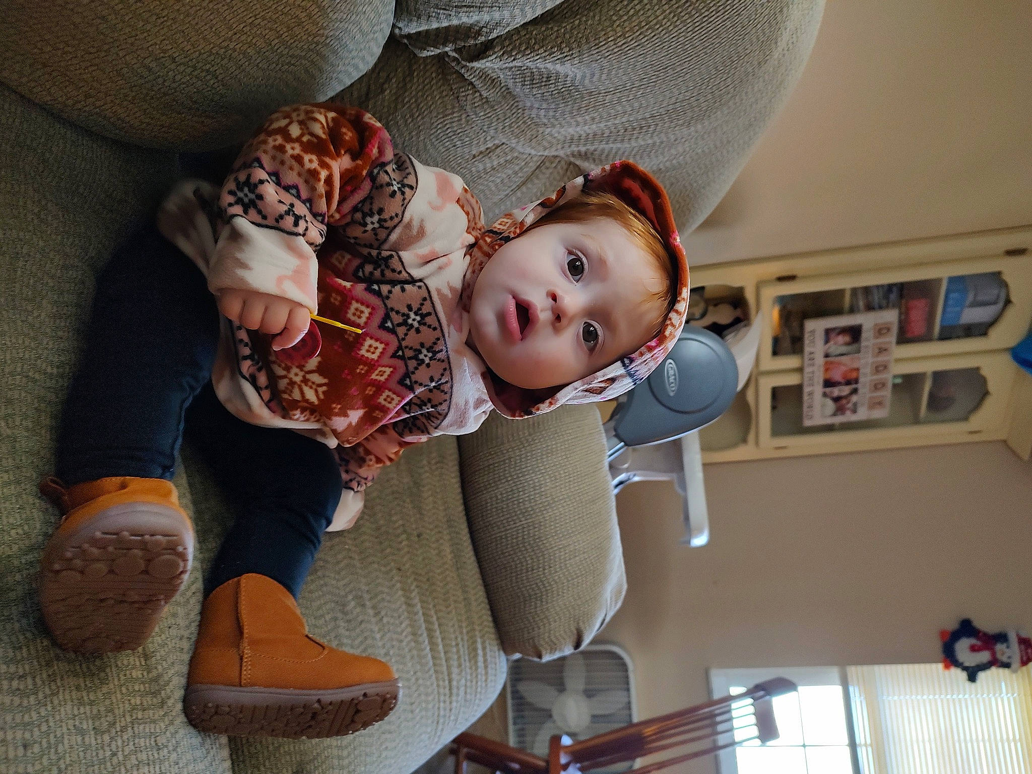 Emma joined the competition — help win amazing prizes! baby, baby_products, child, comfort, finger, flooring, fun, fur, happy, knee, lap, leg, person, picture_frame, room, sitting, surprise, thigh, toddler, wood