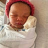 Lelani is registered to the contest to win money with this photo: baby, bed, blanket, closeup, cozy, cute, face, hat, indoors, infant, mitten, newborn, peaceful, portrait, rest, skin, sleeping, soft, tiny, wrapped