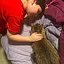 bed, blanket, brown_tabby, caring, cat, child, comfort, feline, floor, friendship, gentle, indoor, pet, purple, red_shirt, resting, side_profile, soft_texture, touch, young