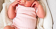 Myrah joined the competition — help win amazing prizes! baby, blanket, bow, child, comfortable, cozy, cushion, cute, headband, indoors, infant, newborn, onesie, peaceful, pink, portrait, resting, sleeping, soft, white