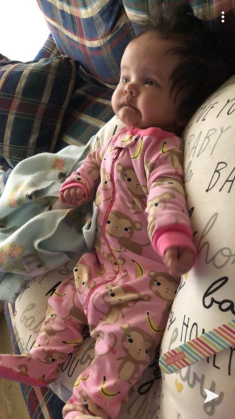 Calie is registered to the contest to win money with this photo: baby, bedtime, cheek, child, nose, person, pink, skin, sleep, sleeve, smile, textile, toddler