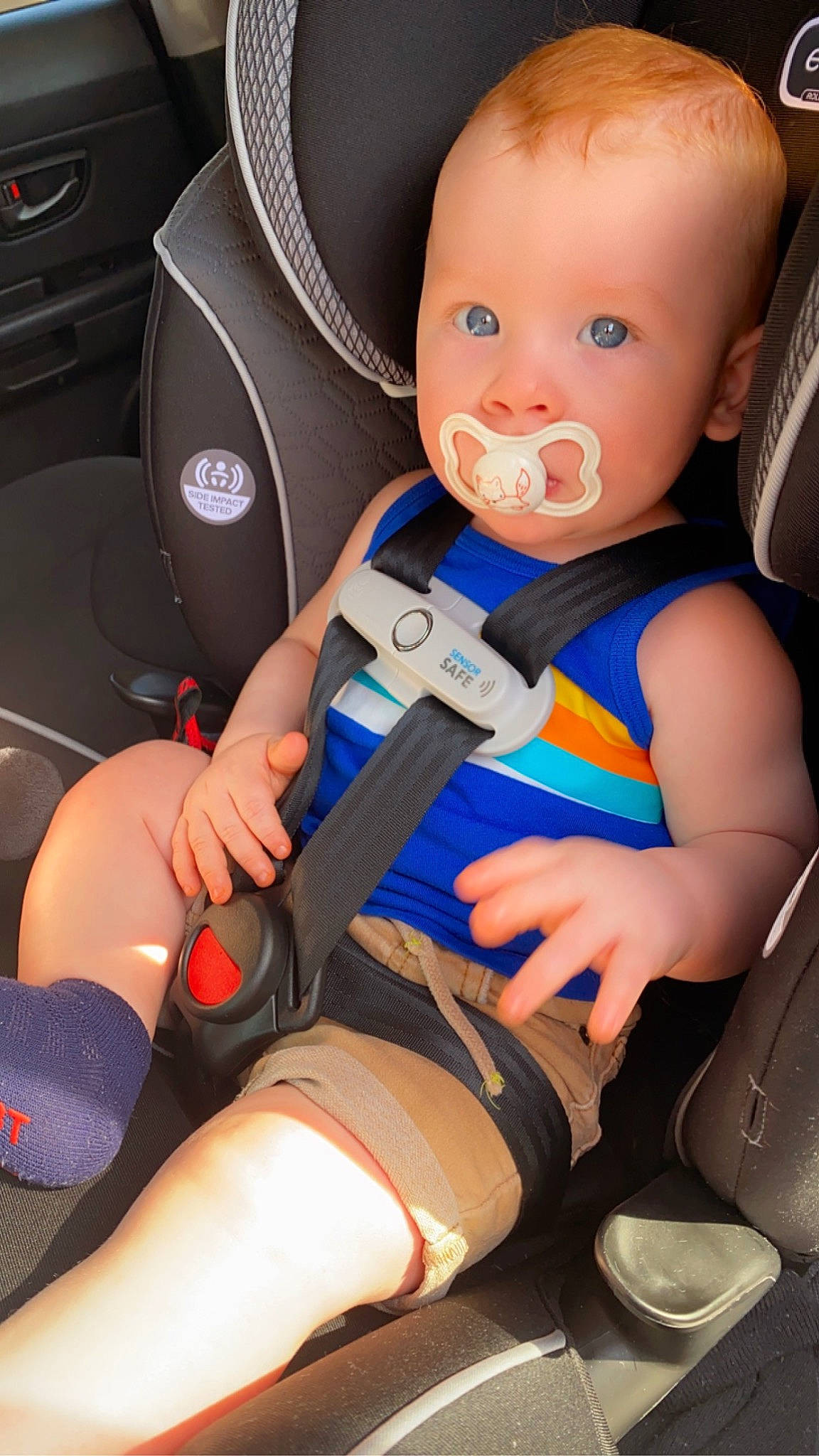 Jensen is registered to the contest to win money with this photo: arm, auto_part, automotive_design, baby, baby_carriage, baby_in_car_seat, car_seat, car_seat_cover, comfort, electric_blue, finger, hand, head_restraint, person, seat_belt, service, steering_part, steering_wheel, thigh, thumb