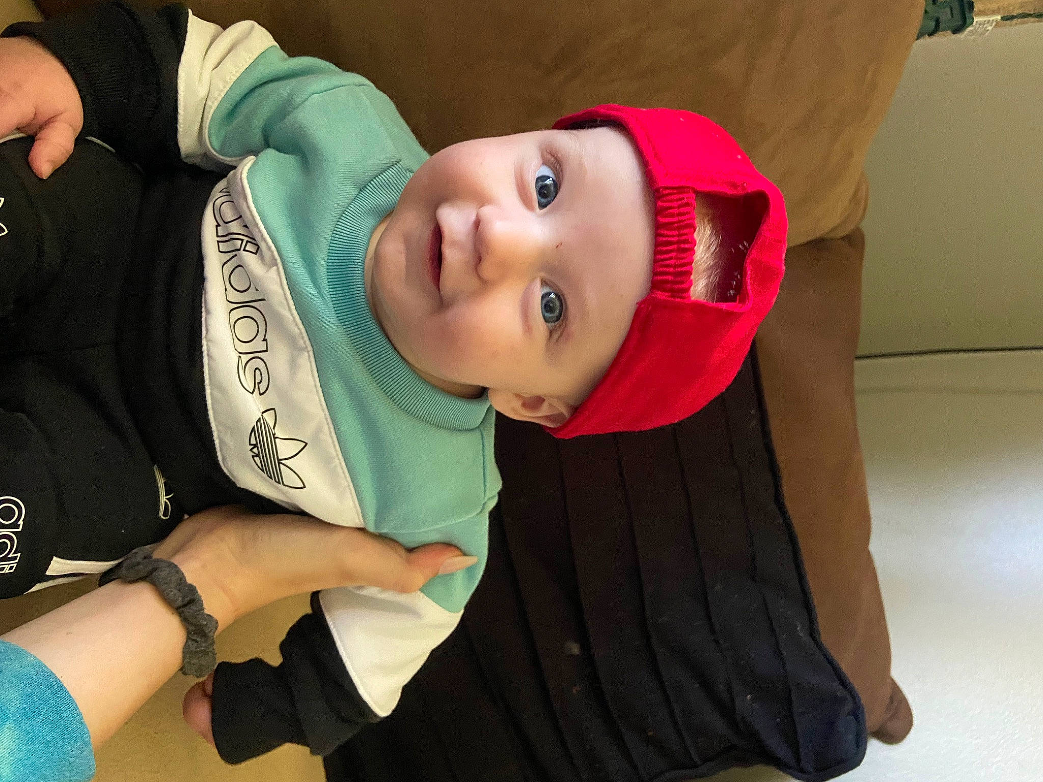 Kai joined the competition — help win amazing prizes! arm, baby, baby_toddler_clothing, cap, cheek, elbow, fashion_accessory, finger, gesture, hand, happy, hat, headwear, joy, leisure, mouth, neck, person, sleeve, smile