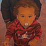 baby, brick_floor, casual_wear, child, closeup, curly_hair, cute, hoodie, infant, looking_up, outdoor, pacifier, pattern, person, portrait, red_clothing, standing, sweatshirt, toddler, young_child