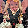 Drew joined the competition — help win amazing prizes! baby, pacifier, car_seat, yellow_bow, infant, child, pink, clothing, seatbelt, safety, cute, portrait, hands, face, wide_eyes, indoor, person, apparel, headwear, expression