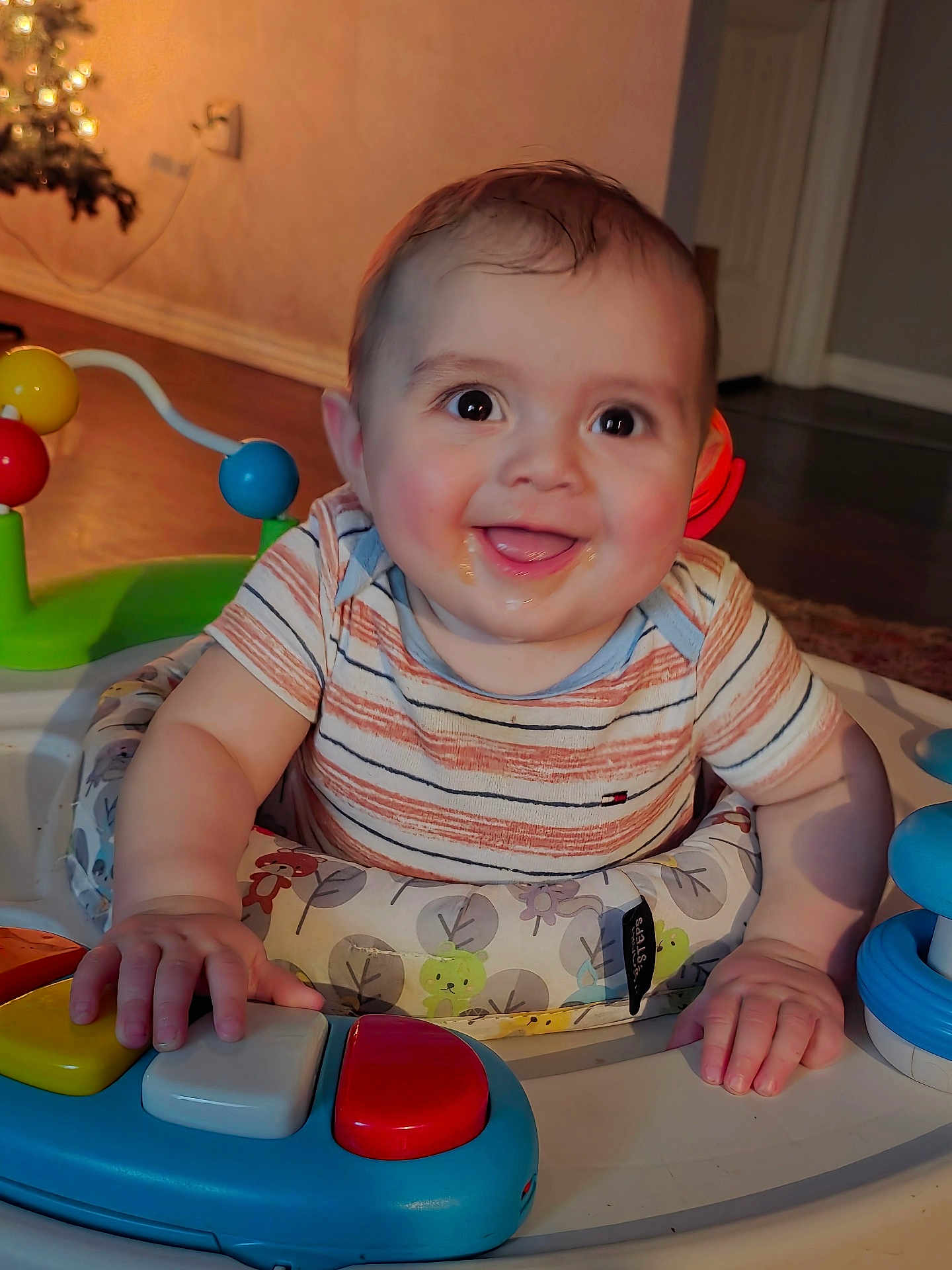 Tre joined the competition — help win amazing prizes! baby, child, smiling, toy, piano, activity_center, indoor, home, happy, playing, infant, colorful, furniture, person, cute, joyful, hands, face, clothing, floor