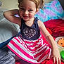 Harley is registered to the contest to win money with this photo: bed, bedroom, child, clothing, couch, cushion, dress, face, female, furniture, girl, head, homedecor, indoors, person, photography, pillow, portrait, room, t_shirt
