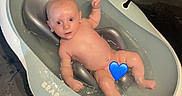 Isandro a rejoint le concours — aidez-le/la à gagner de superbes lots ! baby, bath, bathtub, blue_heart_emoji, care, child, cleaning, cute, expression, floor, indoor, infant, naked, parenting, plastic, sitting, skin, small, water, wet