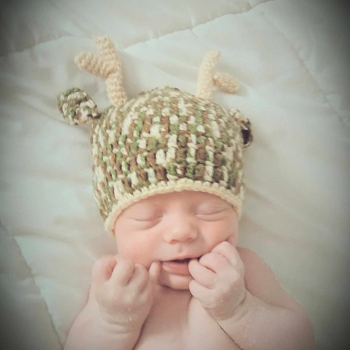 Jakobi is registered to the contest to win money with this photo: beanie, child, crochet, ear, finger, girl, hair_accessory, hand, headgear, headpiece, infant, jewellery, knit_cap, nose, photography, portrait_photography, skin, toddler