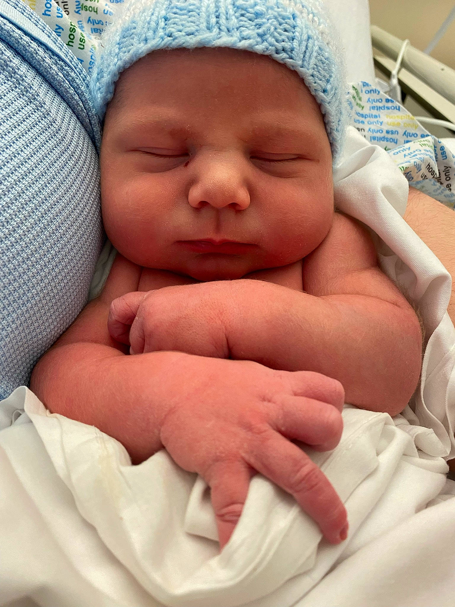 Jenson joined the competition — help win amazing prizes! baby, baby_sleeping, cap, child, chin, comfort, face, facial_expression, finger, gesture, hand, headwear, lip, mouth, nose, person, photograph, pink, skin, textile