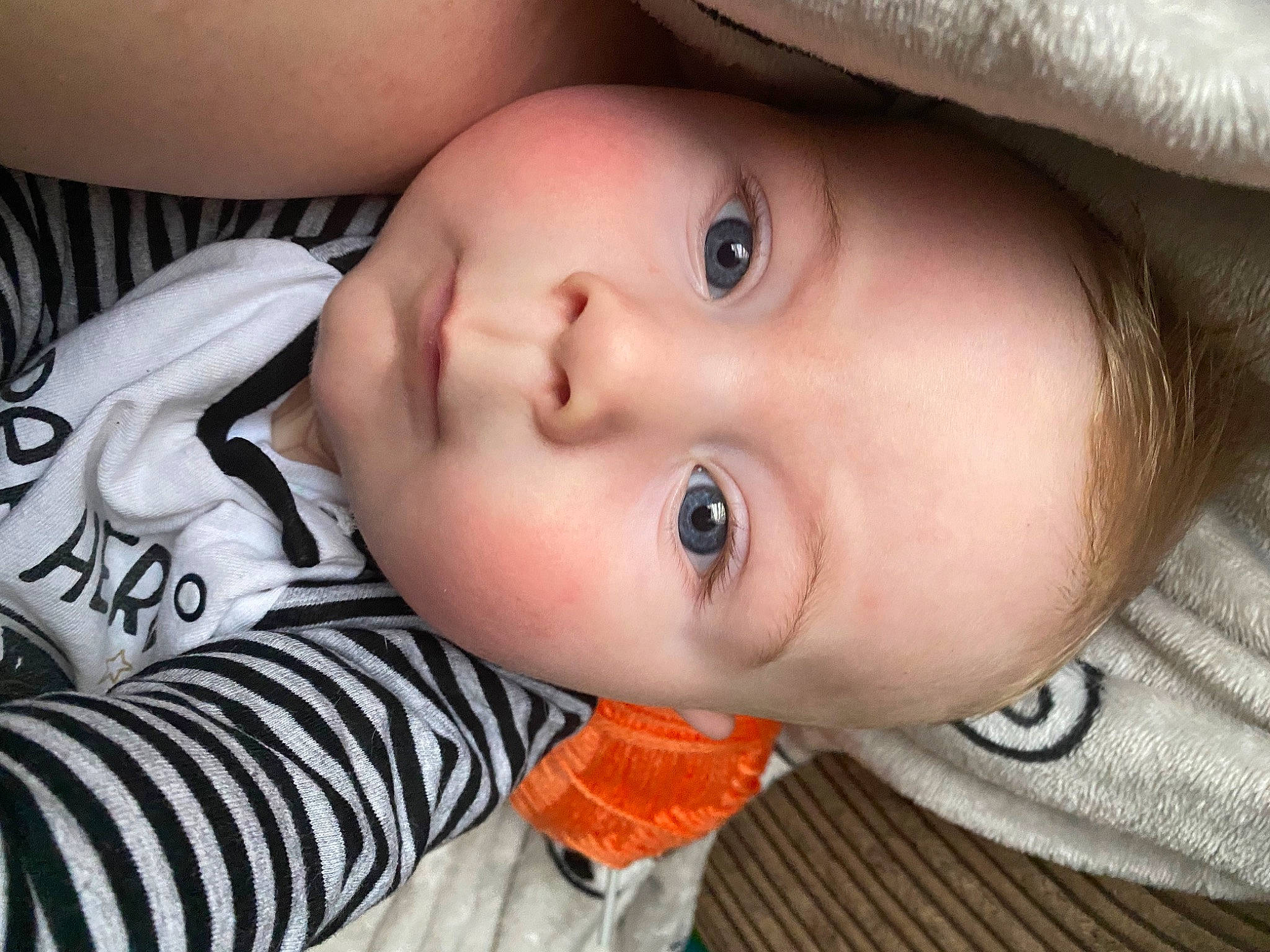 Jenson is registered to the contest to win money with this photo: baby, baby_toddler_clothing, cheek, chin, clothing, eye, eyebrow, eyelash, forehead, head, human_body, iris, lip, mammal, mouth, neck, nose, person, skin, sleeve