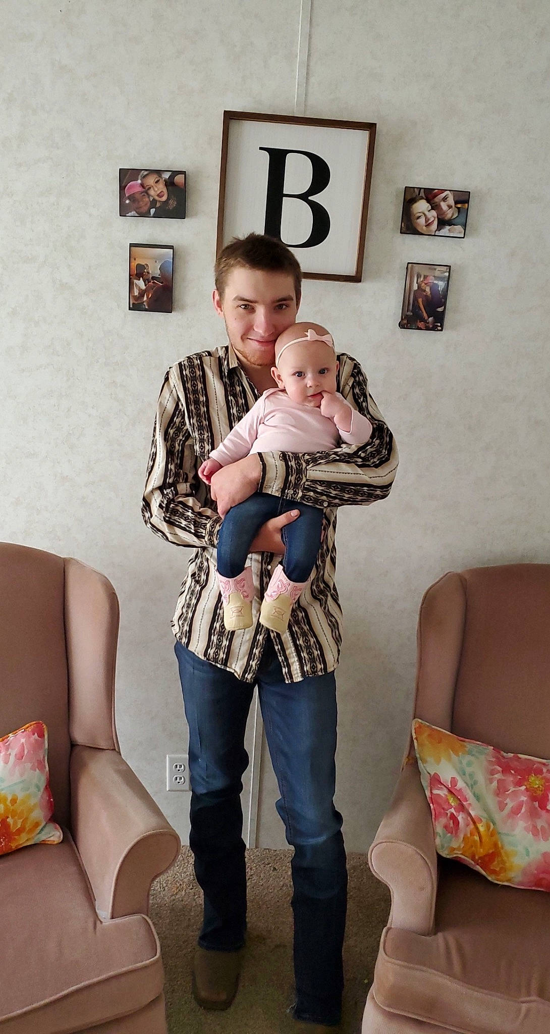 Carrie is registered to the contest to win money with this photo: baby, comfort, couch, event, fashion, furniture, hairstyle, happy, interior_design, joy, lap, leg, living_room, person, picture_frame, product, shoulder, skin, smile, t_shirt