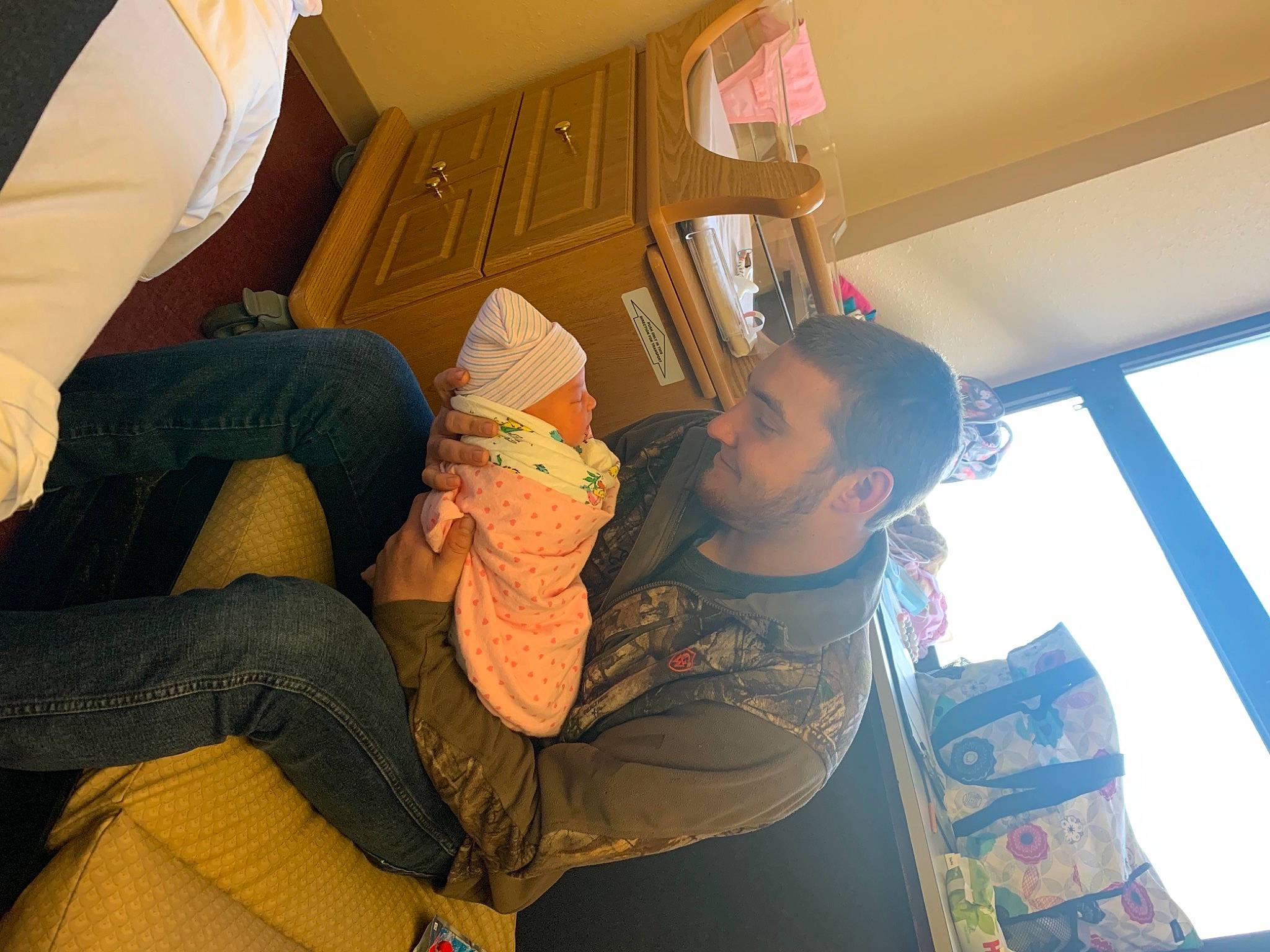 Carrie joined the competition — help win amazing prizes! baseball_cap, comfort, cool, eyewear, finger, fun, glasses, hand, hat, human_body, jeans, knee, lap, leg, lighting, person, shoulder, standing, t_shirt, thigh