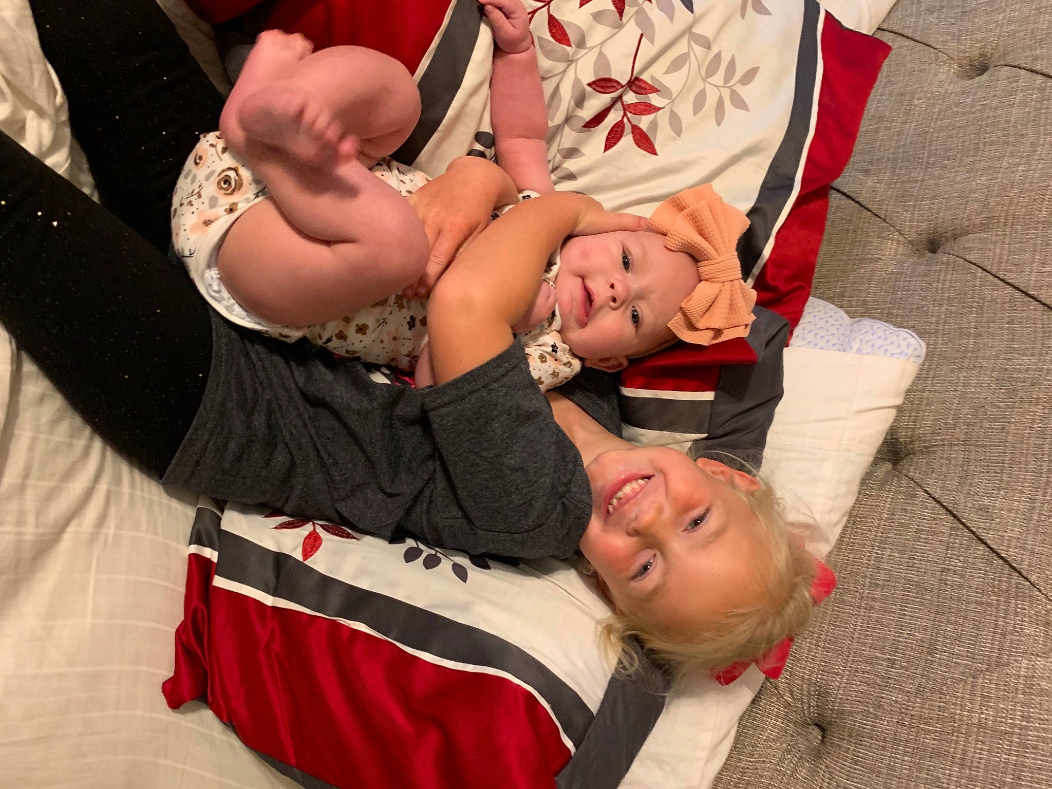 Carrie is registered to the contest to win money with this photo: arm, bracelet, carmine, elbow, event, fashion_accessory, finger, flag_of_the_united_states, flesh, fun, gesture, hand, happy, headwear, human_leg, jewellery, joy, nail, person, smile