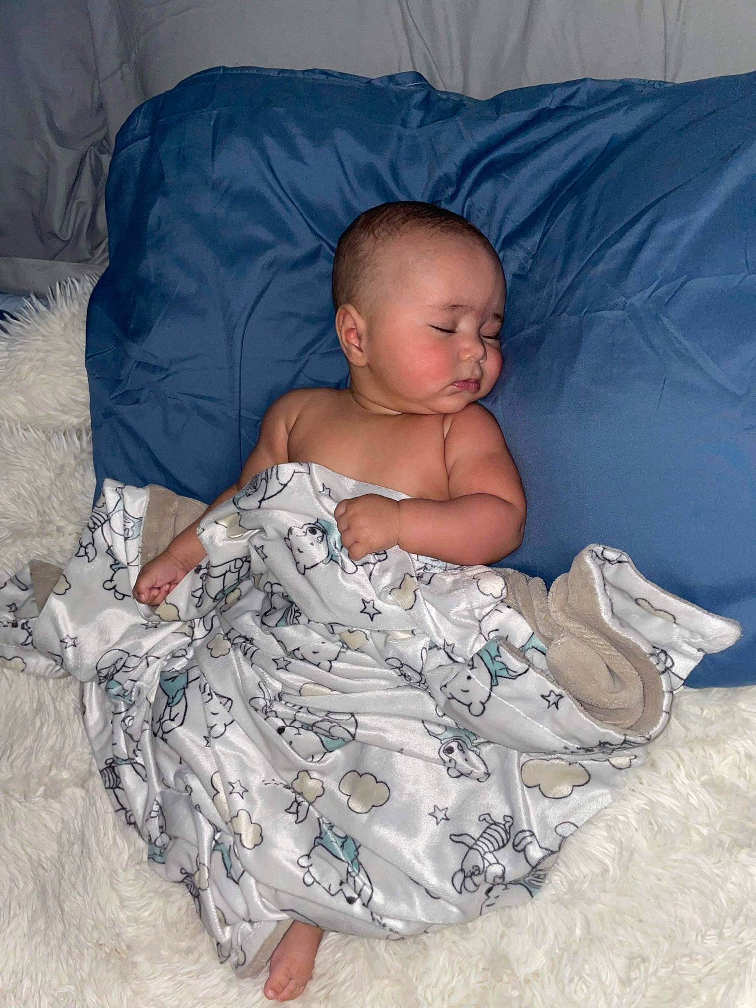 Hakeem joined the competition — help win amazing prizes! arm, baby, baby_toddler_clothing, bedding, child, comfort, couch, eye, flooring, hand, head, human_body, iris, leg, linens, pattern, person, room, sitting, textile