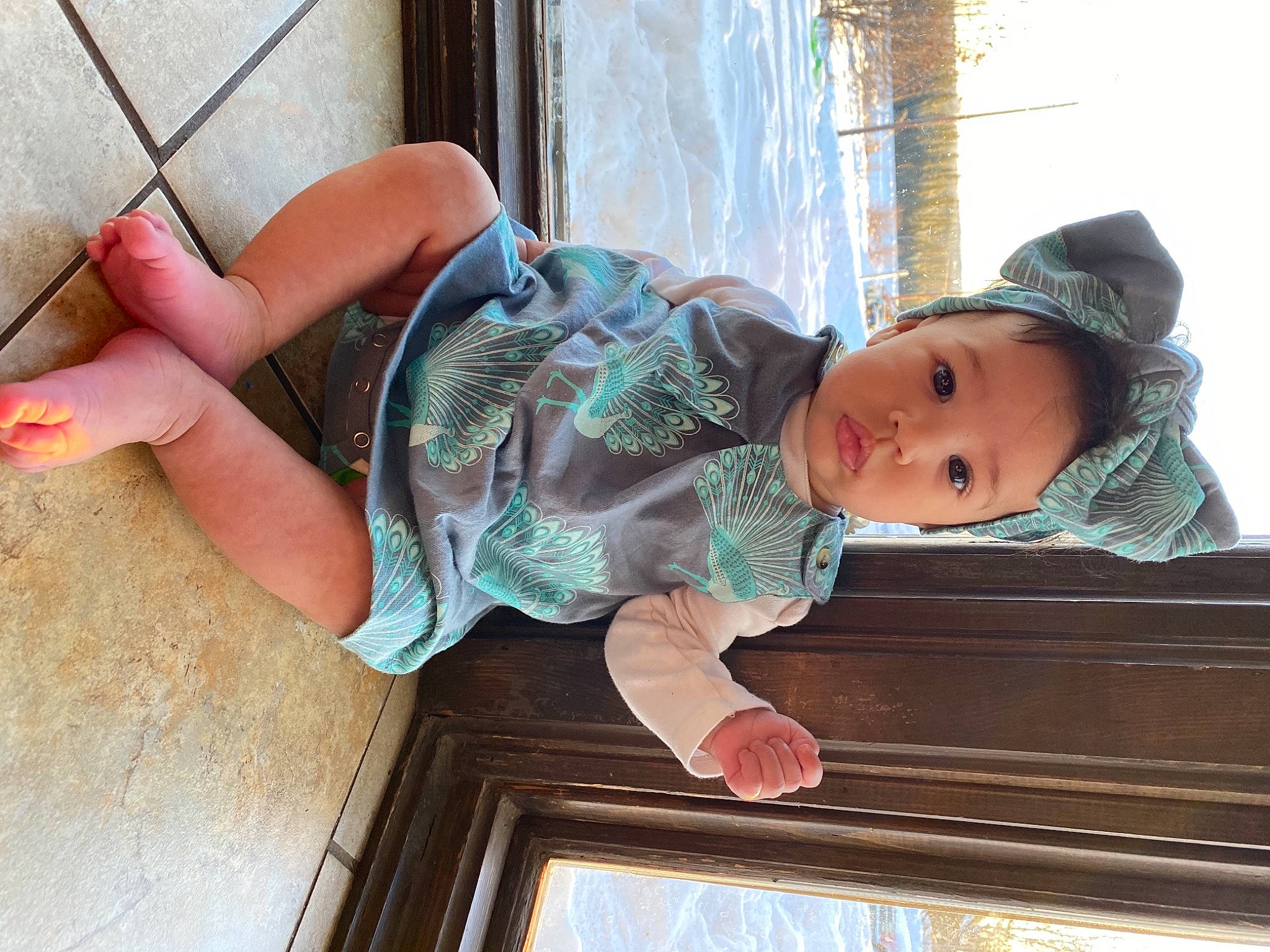 Isla joined the competition — help win amazing prizes! baby, baby_toddler_clothing, child, facial_expression, finger, foot, fun, hand, hat, human, human_leg, mouth, person, pink, sitting, skin, standing, thigh, toddler, vertebrate