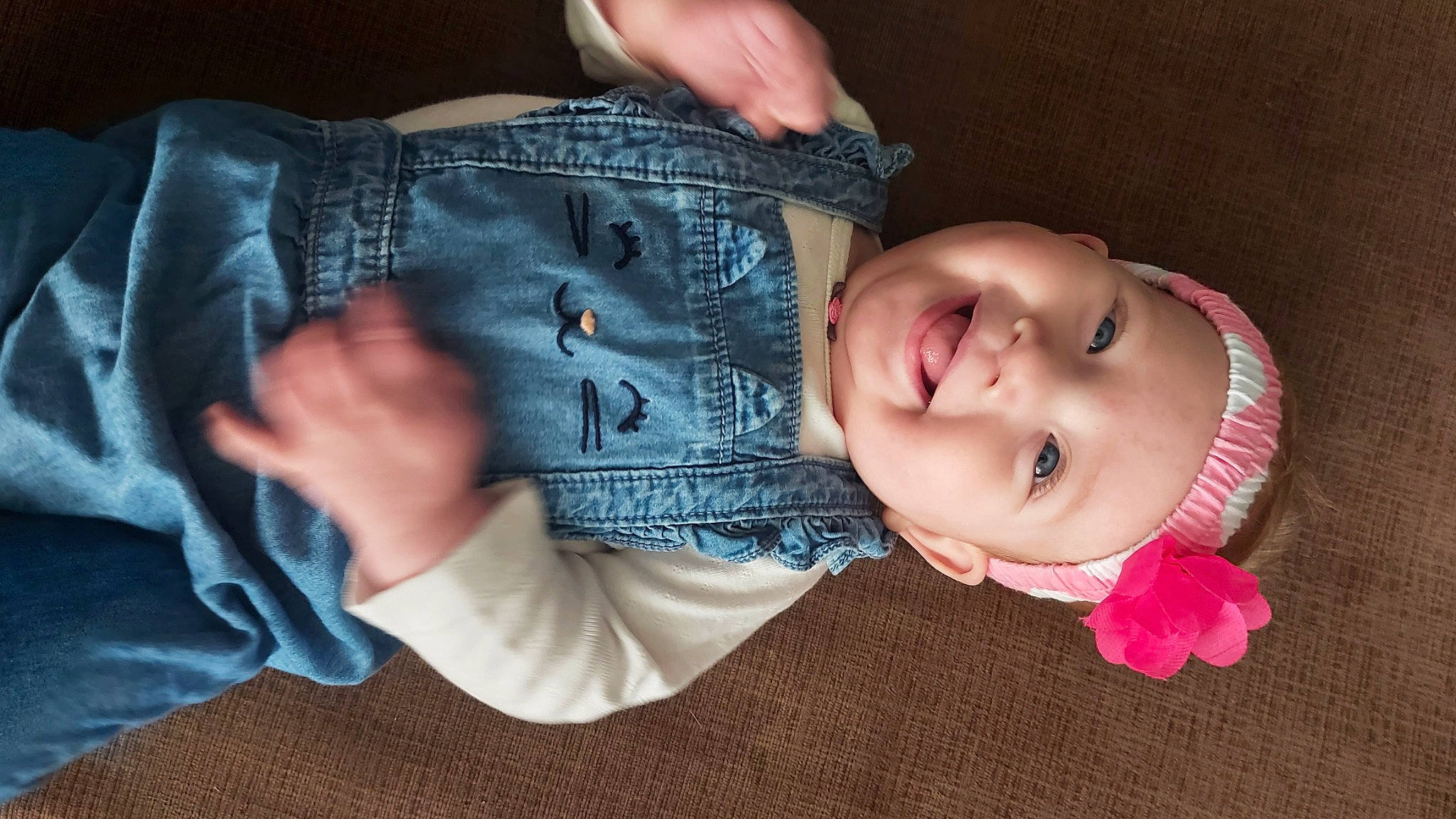 Mackenna is registered to the contest to win money with this photo: arm, baby, baby_toddler_clothing, cheek, comfort, eye, face, finger, gesture, glasses, hand, head, headwear, iris, joy, lip, mouth, nose, person, skin