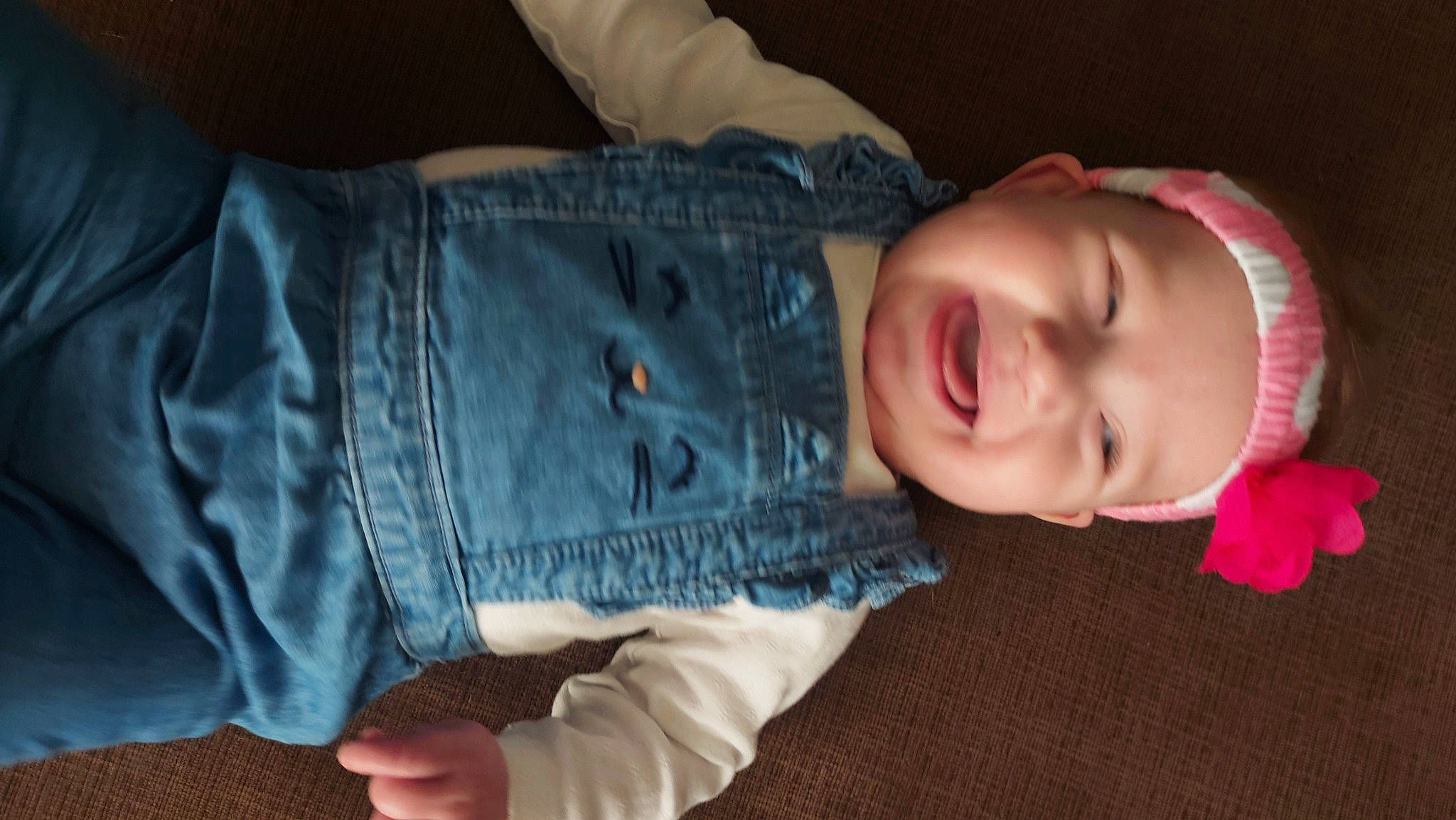 Mackenna joined the competition — help win amazing prizes! baby, baby_toddler_clothing, cheek, child, comfort, denim, finger, fun, headwear, human_body, human_leg, jeans, nose, pattern, person, sitting, skin, sleeve, smile, textile