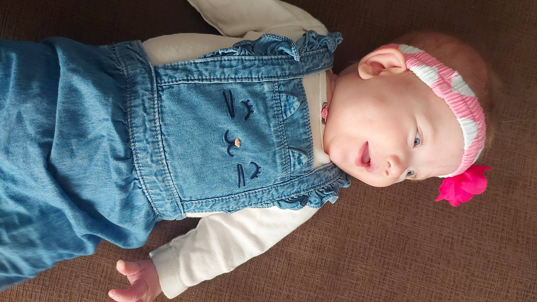 Mackenna is registered to the contest to win money with this photo: arm, baby, baby_toddler_clothing, child, comfort, denim, eye, eyelash, finger, glasses, human_body, lip, nose, person, skin, sleeve, textile, thigh, toddler, waist