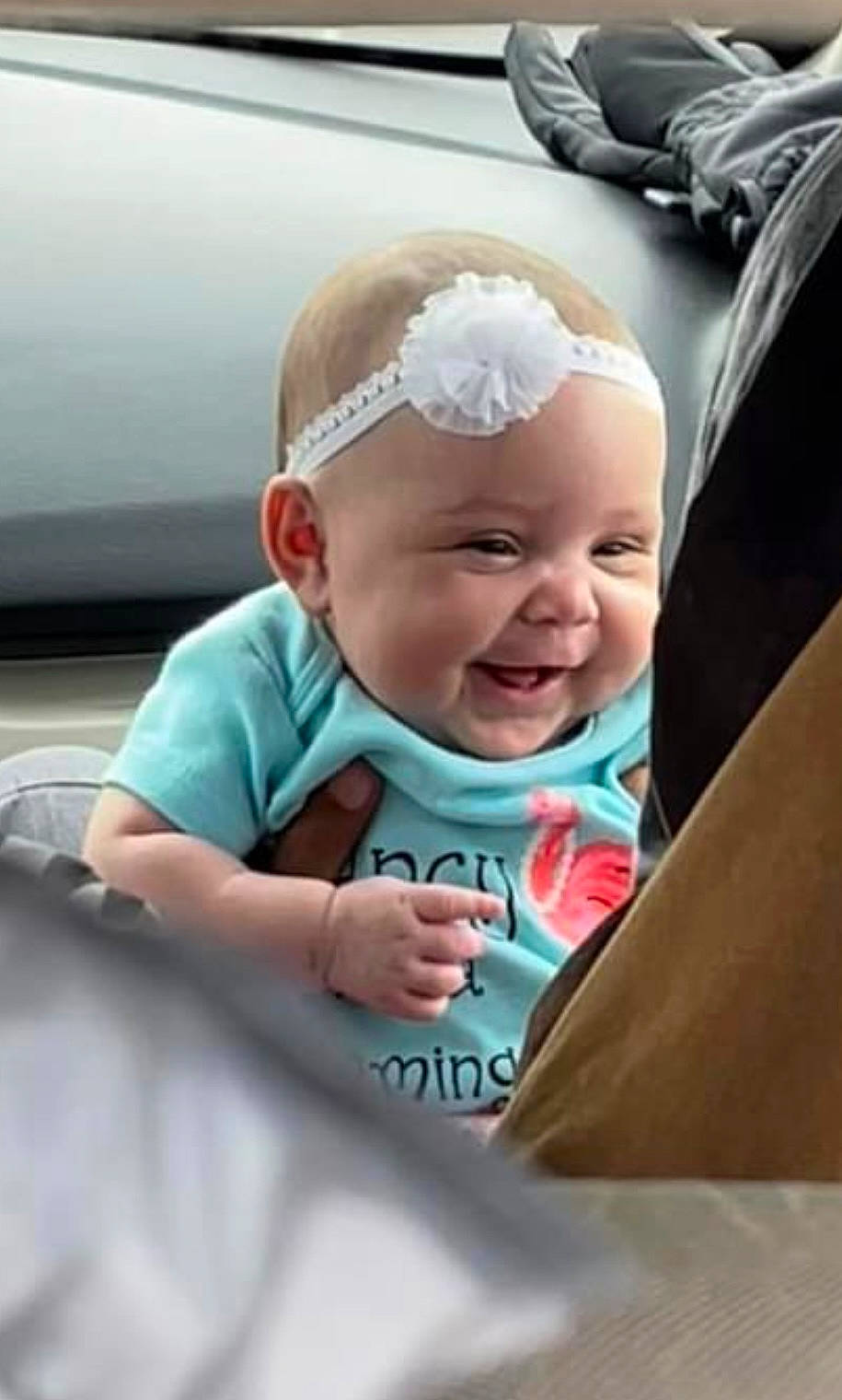 Ariella joined the competition — help win amazing prizes! baby, baby_carriage, baby_products, baby_toddler_clothing, cap, cheek, child, comfort, fashion_accessory, fun, happy, headband, headwear, laugh, person, portrait_photography, sitting, skin, sleeve, smile