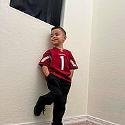 Matthew is registered to the contest to win money with this photo: bodypart, boy, child, clothing, coat, face, finger, footwear, formalwear, head, jacket, longsleeve, male, pants, person, photography, portrait, shoe, sleeve, t_shirt