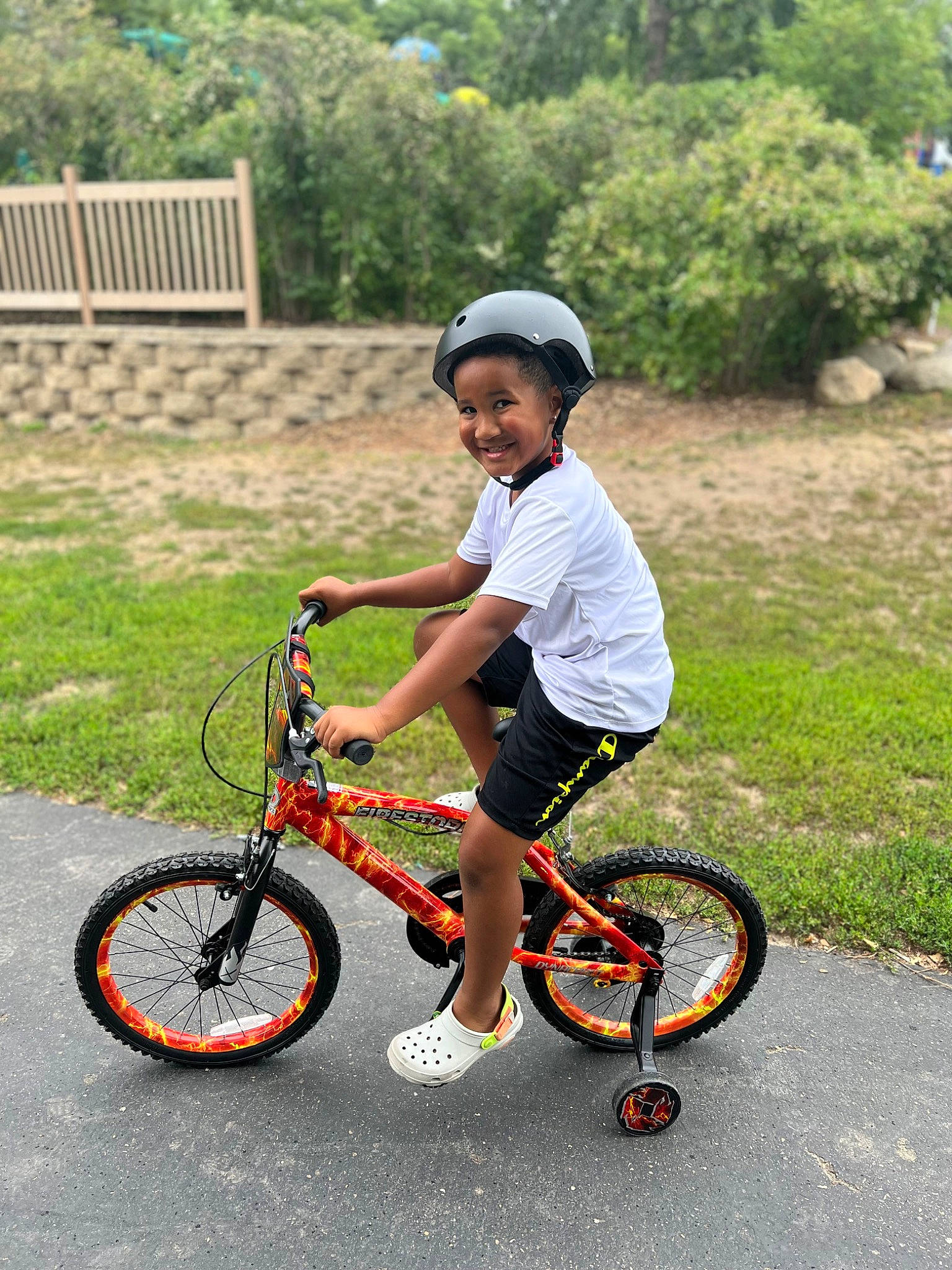 Adrian is registered to the contest to win money with this photo: automotive_tire, bicycle, bicycle_accessory, bicycle_fork, bicycle_frame, bicycle_handlebar, bicycle_helmet, bicycle_saddle, bicycle_tire, bicycle_wheel, bicycles_equipment_and_supplies, crankset, helmet, joy, land_vehicle, person, plant, shorts, smile, tire