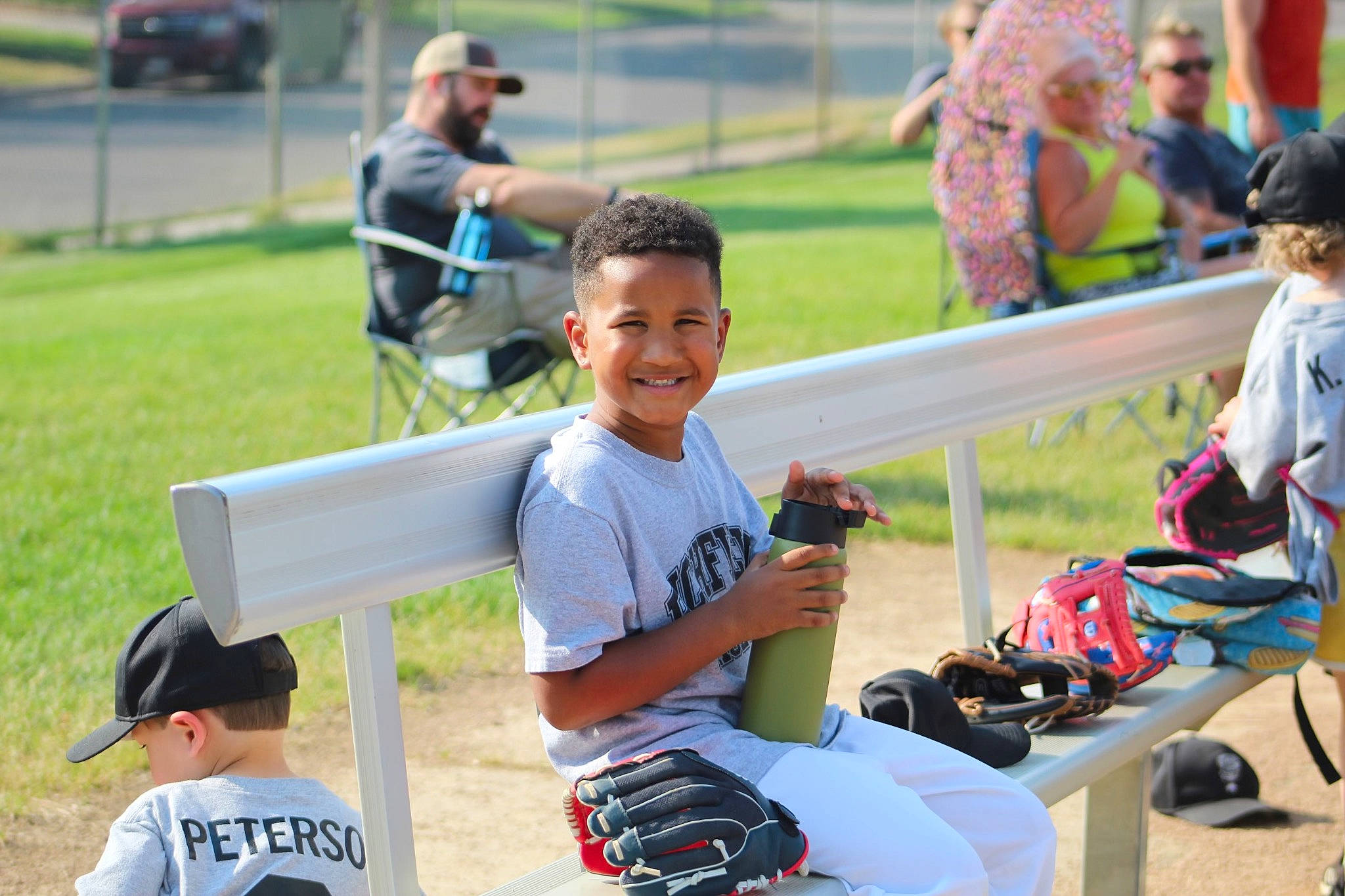 Adrian joined the competition — help win amazing prizes! bench, blurred, chair, championship, competition, competition_event, event, fun, grass, happy, hat, headwear, joy, leisure, person, player, recreation, shorts, smile, sports