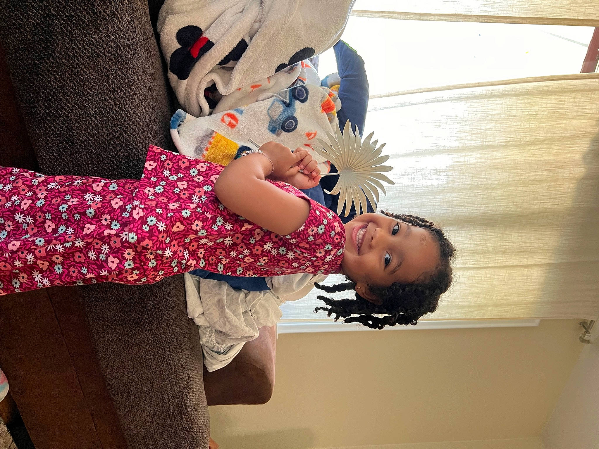 Alina is registered to the contest to win money with this photo: baby_toddler_clothing, child, elbow, fashion_accessory, fashion_design, finger, fun, gesture, happy, human_leg, joint, joy, nail, pattern, person, room, sleeve, textile, thigh, toddler